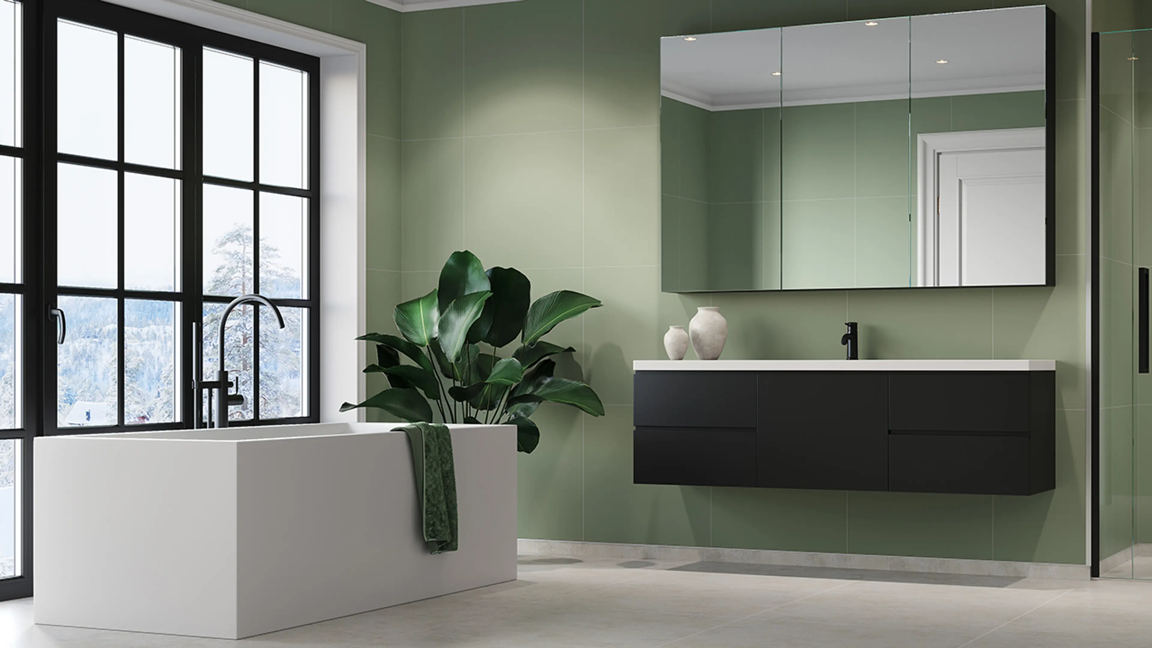 Bad med Olivegreen veggplater, sorte baderomsmøbler og hvitt badekar.