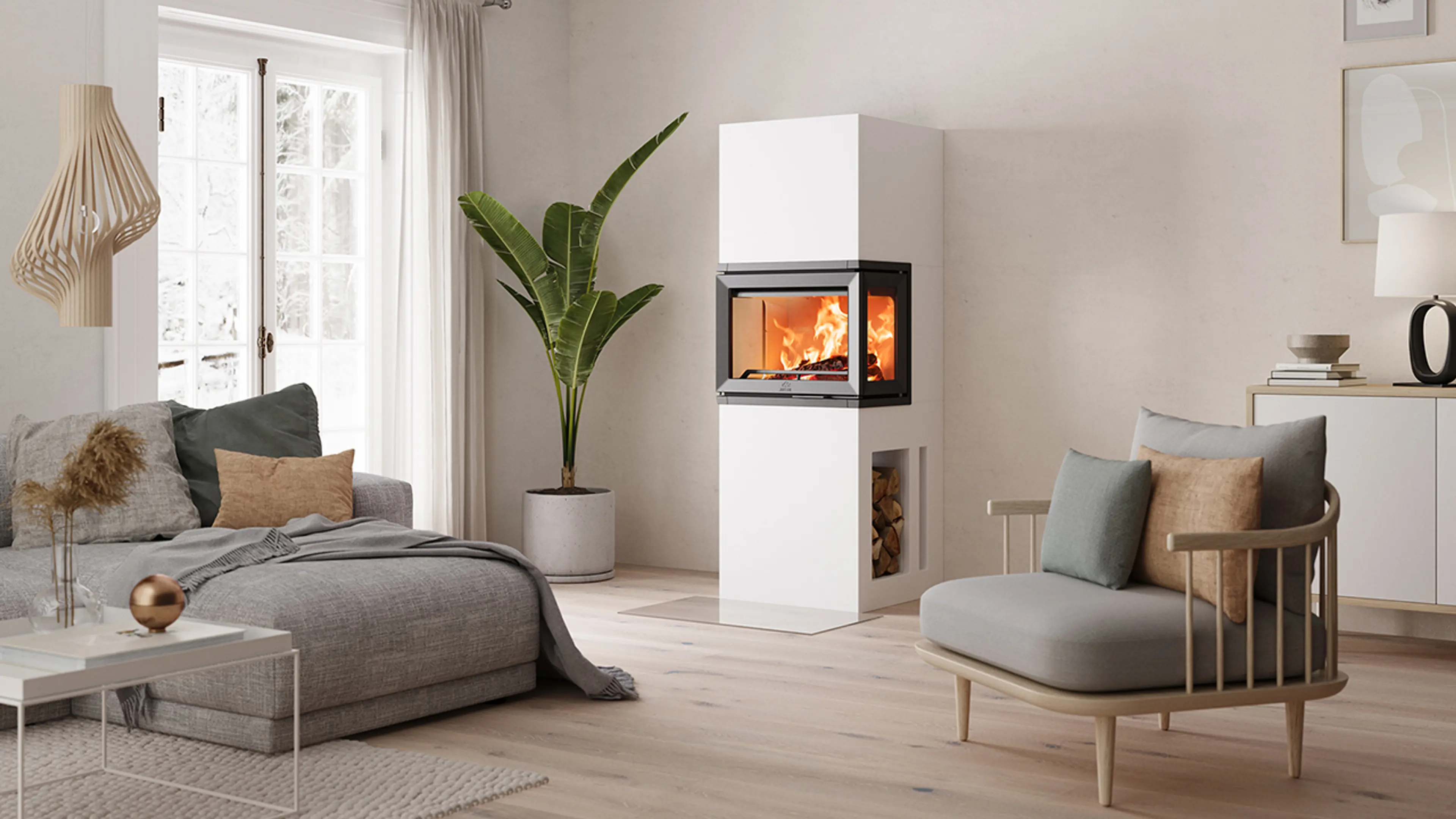 Hvit peis med vedhylle i moderne stue.