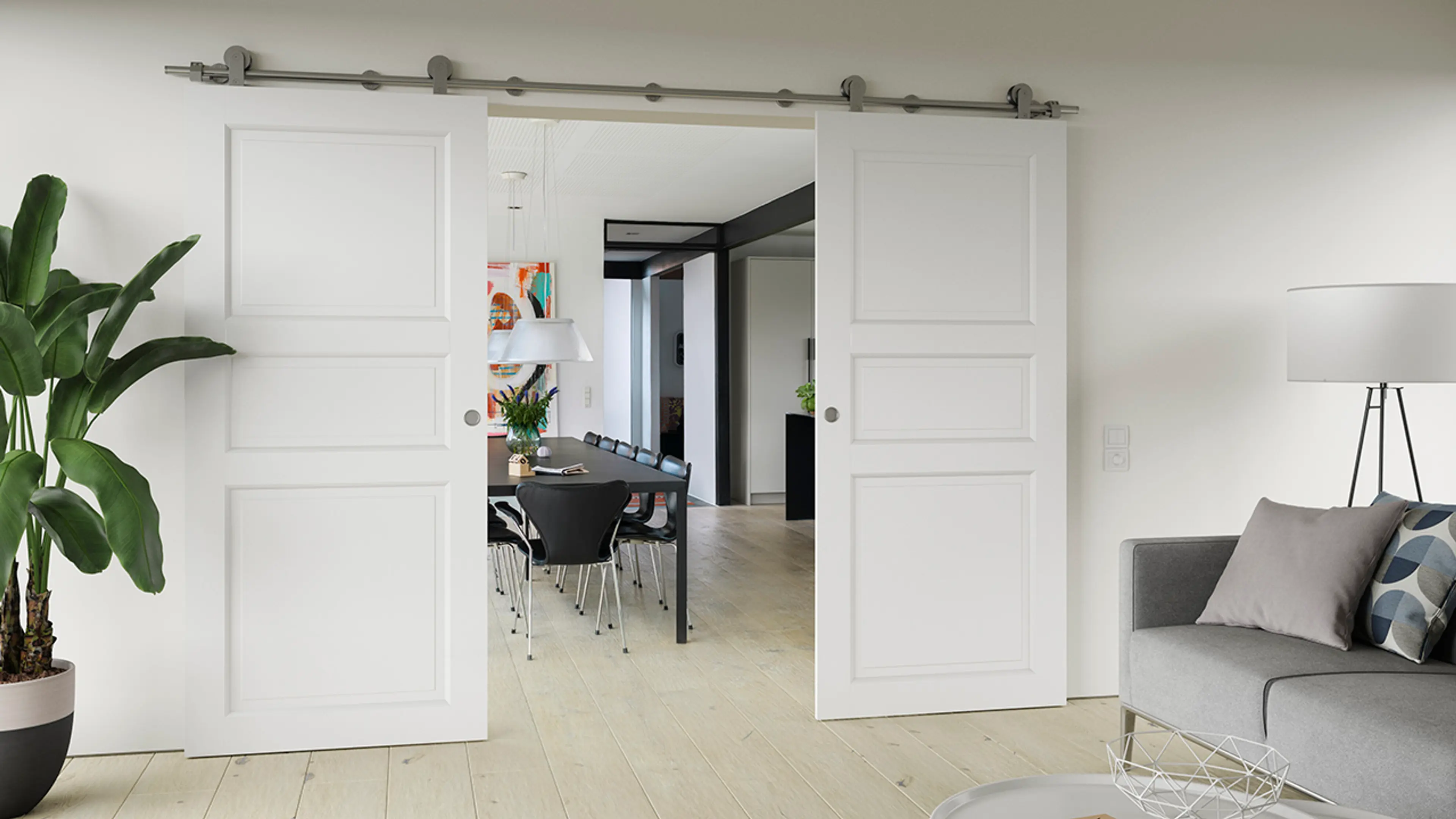 Hvit dobbel skyvedør i stue.