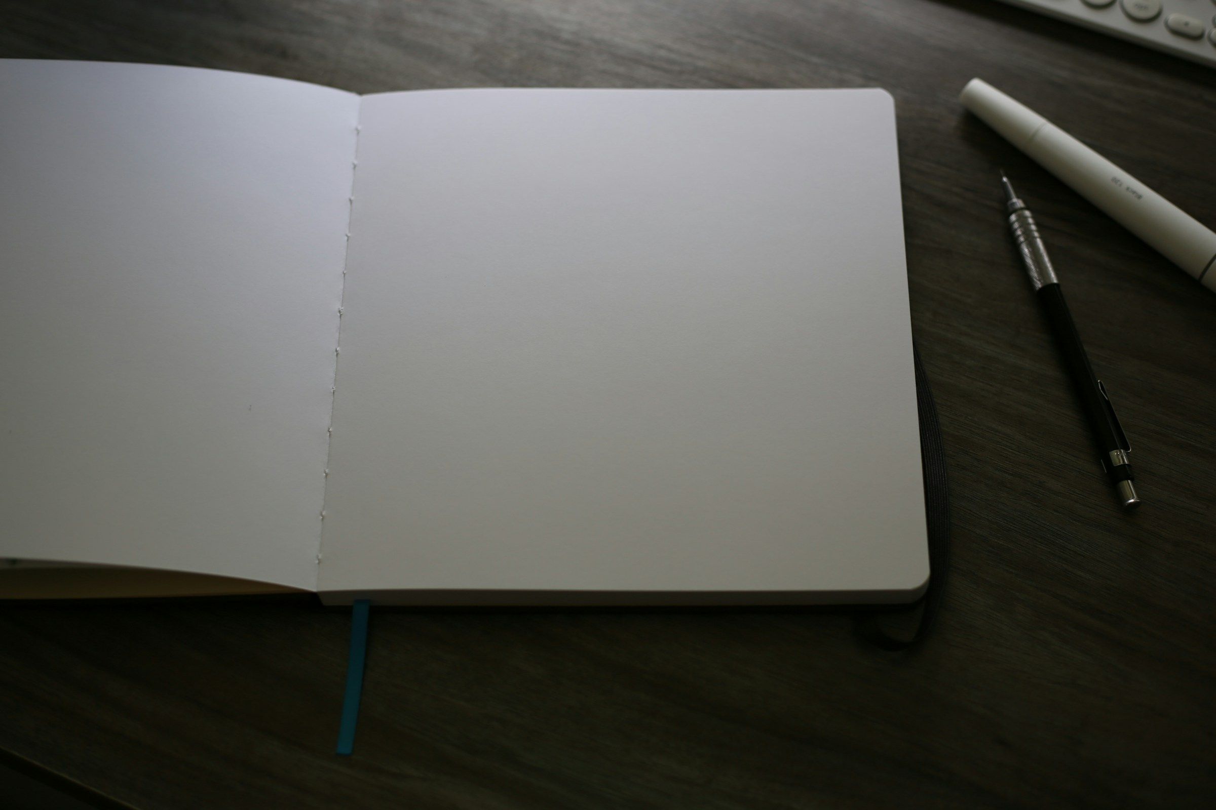 person with a paper - How to Use the Charting Method of note-taking