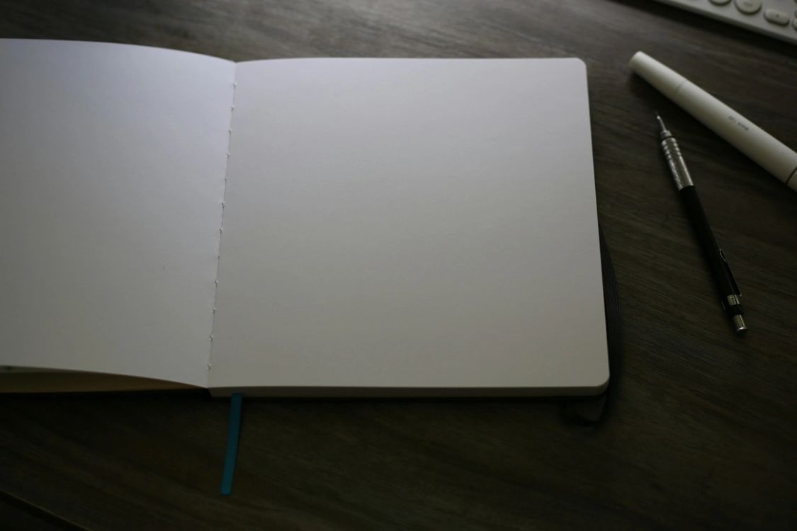 person with a paper - How to Use the Charting Method of note-taking