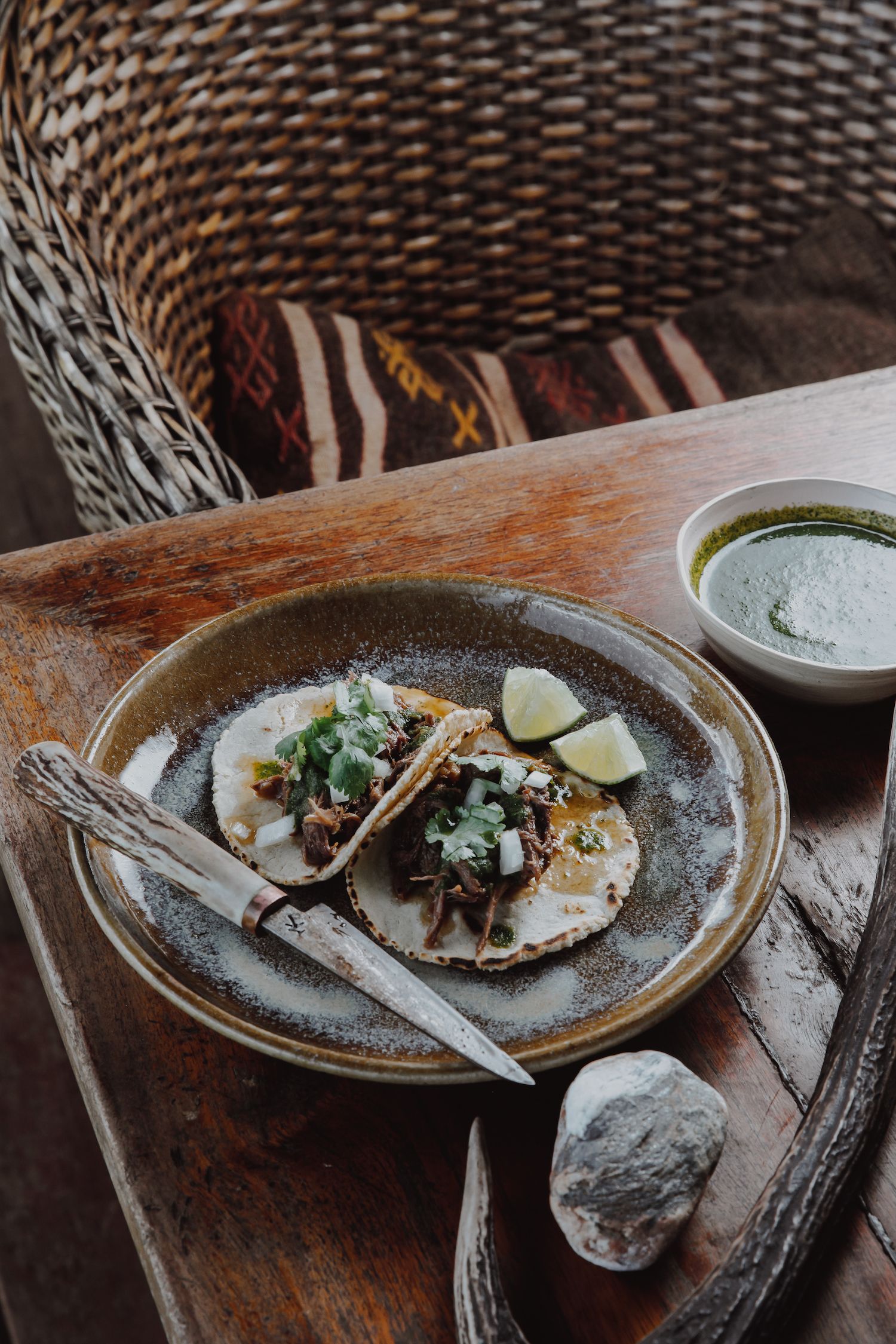 Venison neck tacos served on a plate