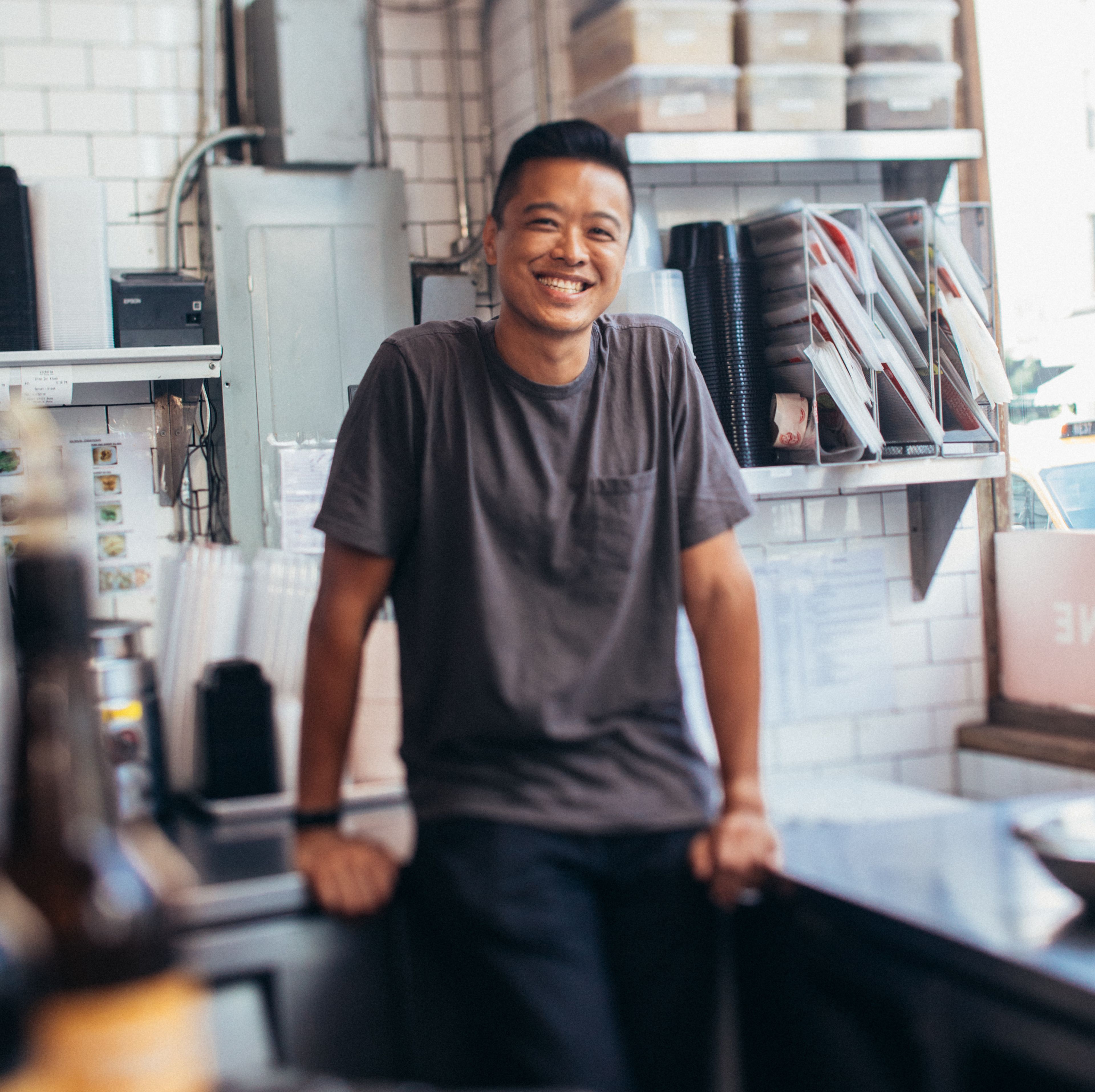 Portrait of Wilson Tang in his kitchen