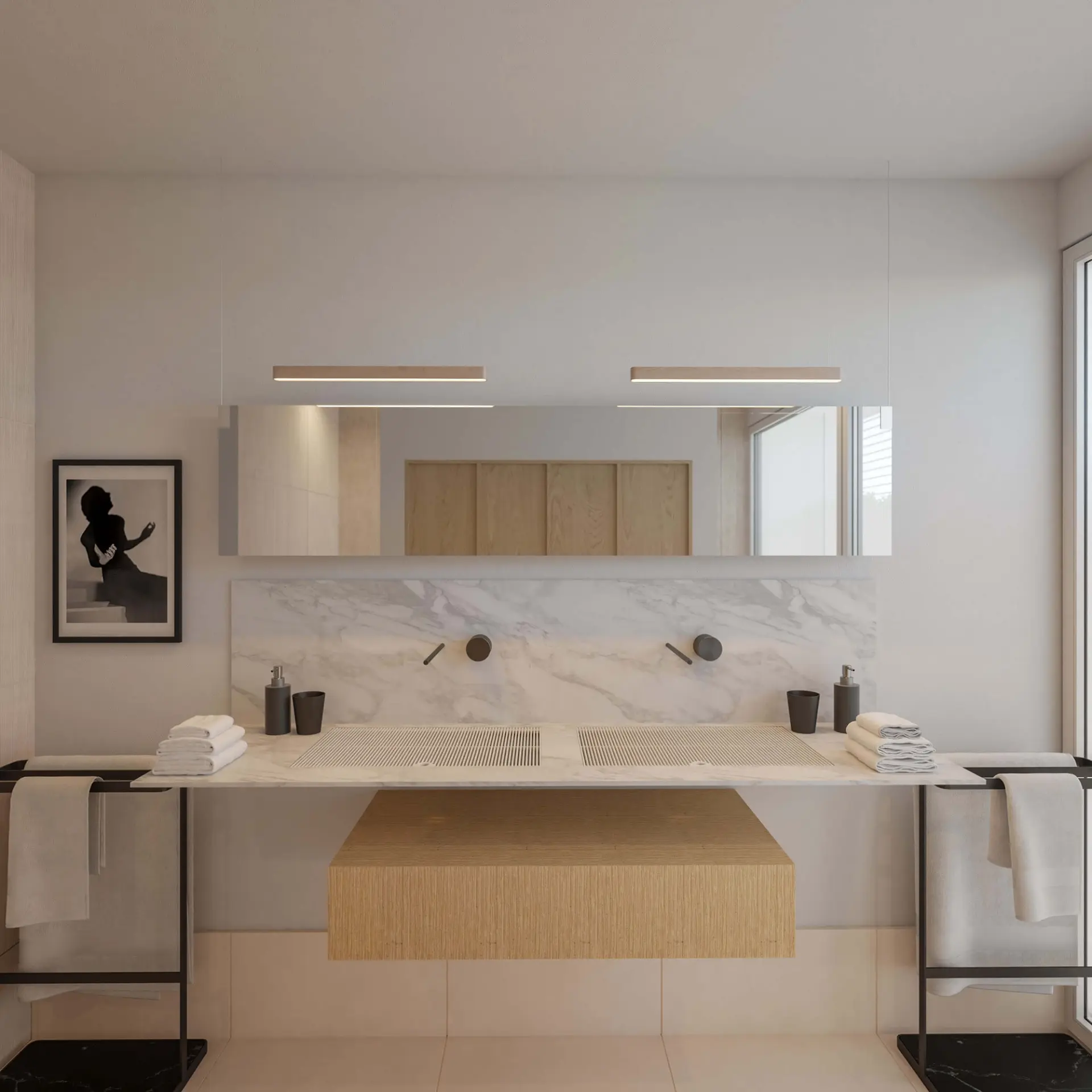 Bathroom with double marble vanity, full-width mirror with integrated lighting and black floor towel rails — luxury interior design Lisbon