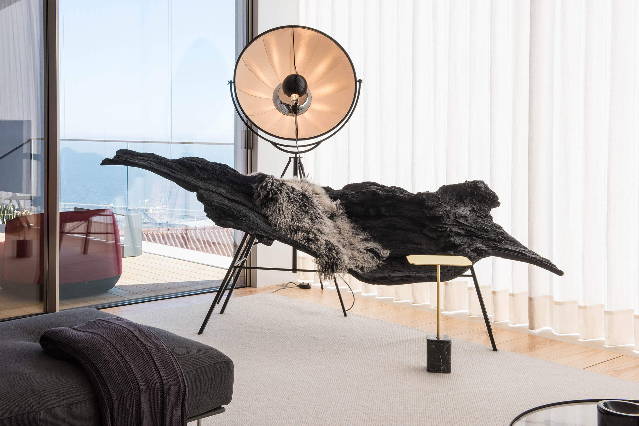 Imperfecto Lab Bioma organic chaise longue and Palluco Fortuny floor lamp with Tagus River views — luxury interior design, Lisbon, Atelier Renata Santos Machado