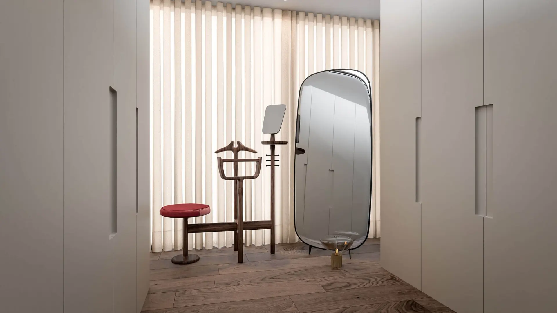 Walk-in wardrobe with floor-to-ceiling built-in closets, oval floor mirror and red velvet stool — luxury interior design Lisbon Portugal