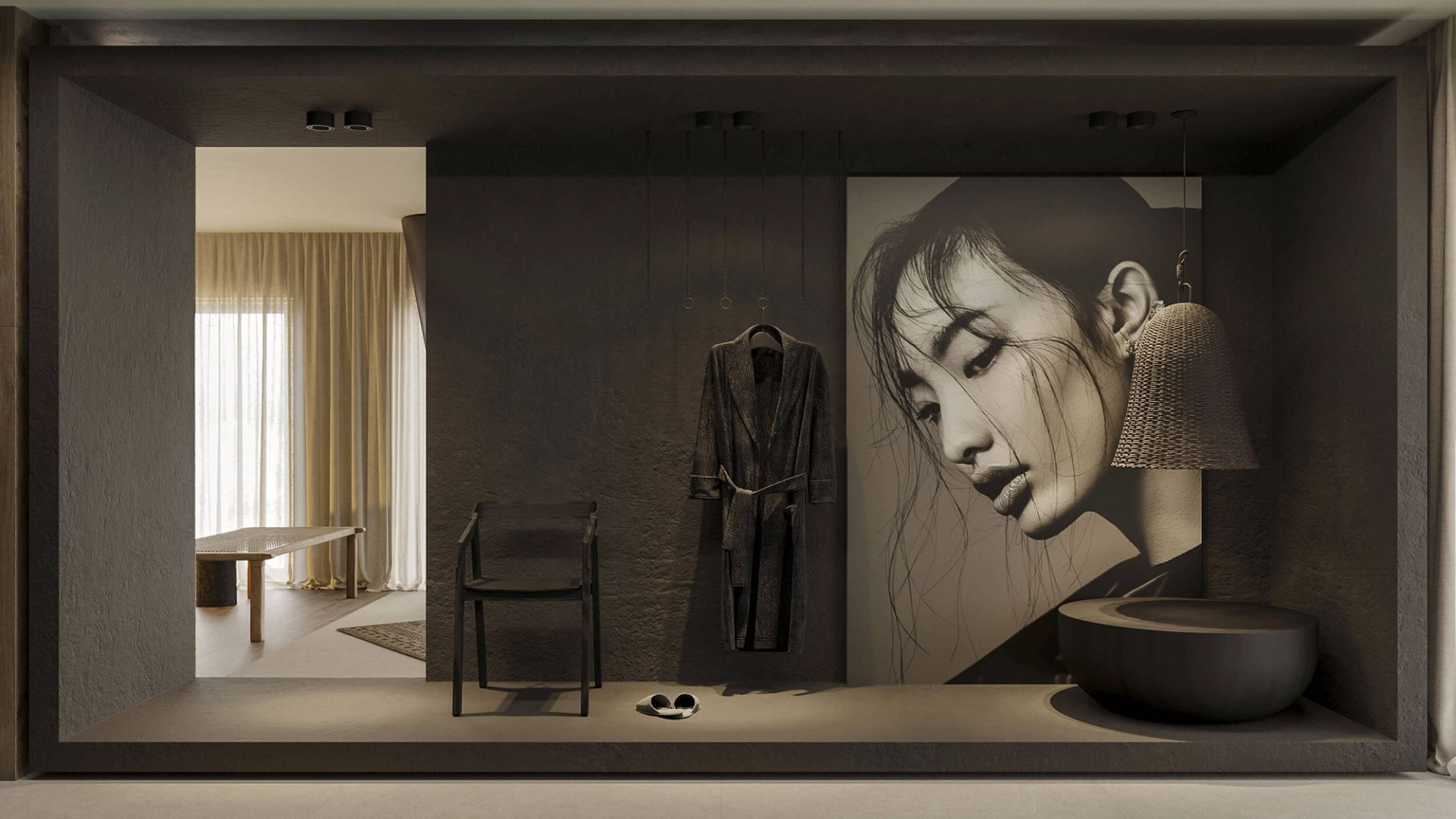Dark microcement spa suite with an oval tub, a large-format portrait photograph, a hanging robe and a folding chair — luxury bathroom