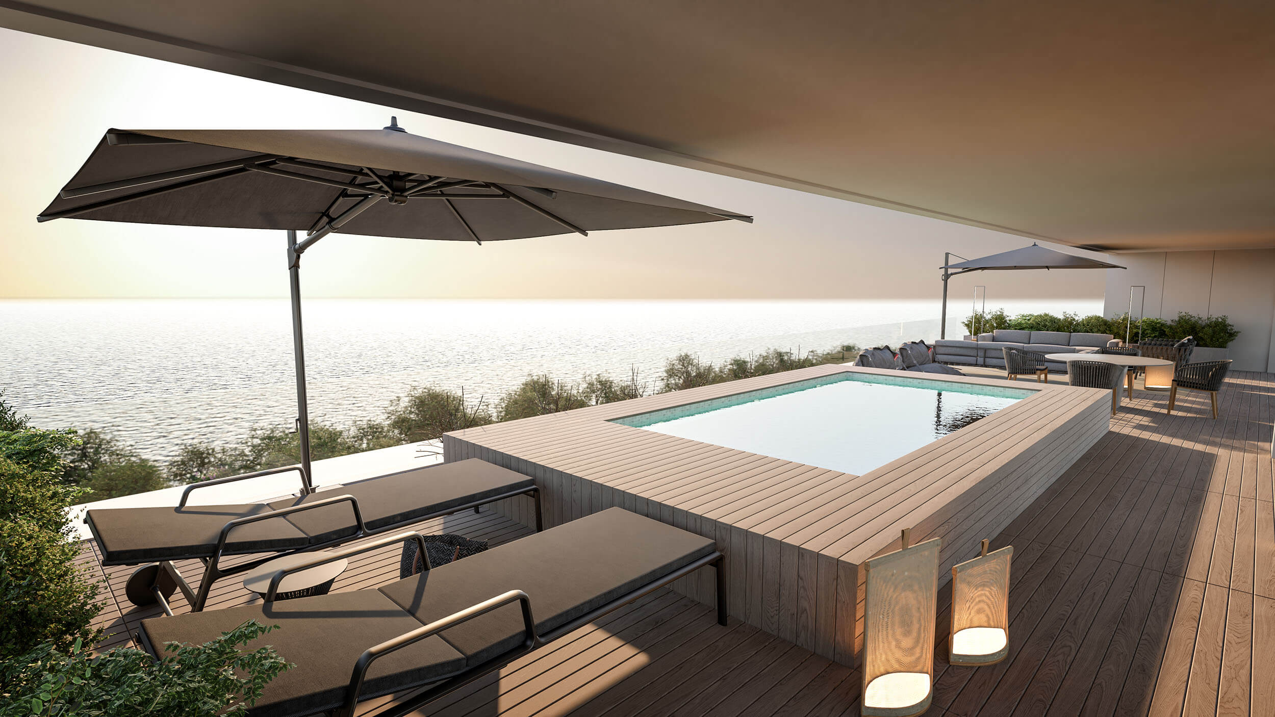 Piscina elevada em deck de madeira com vista para o mar, espreguiçadeiras pretas e iluminação suave.