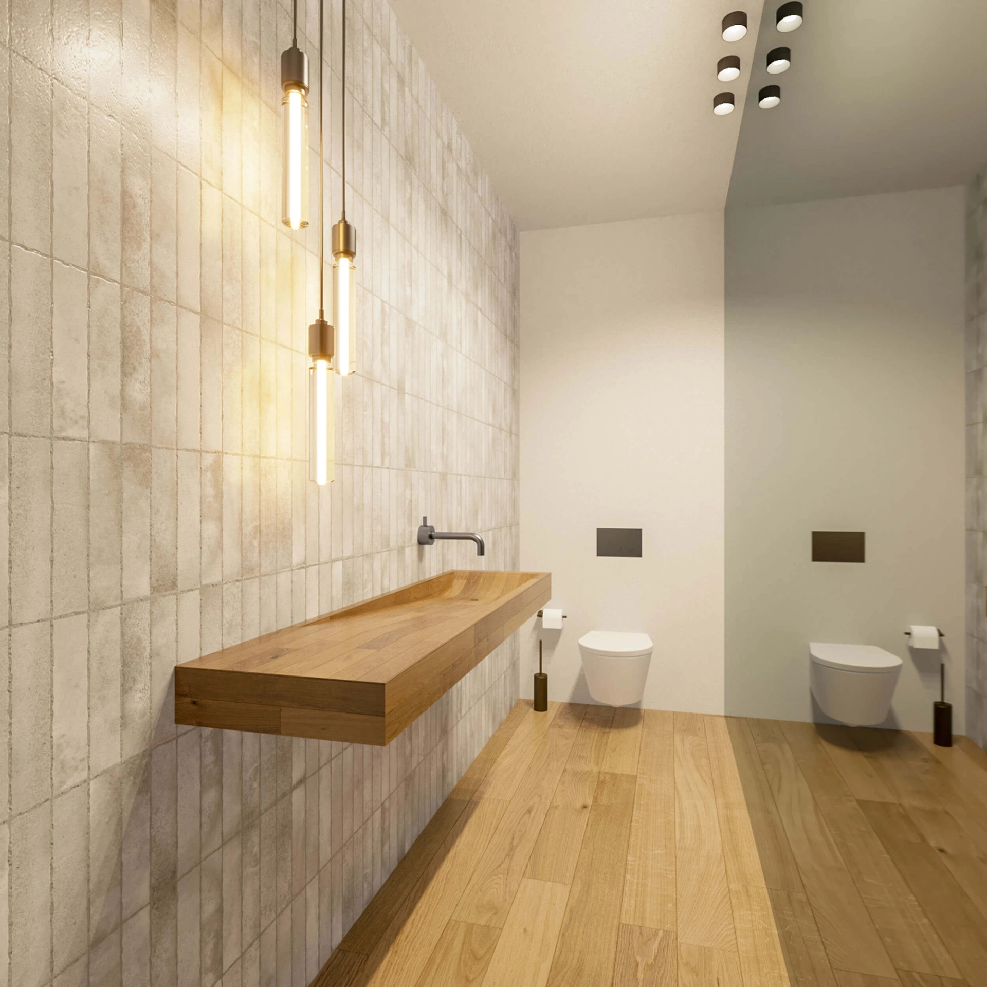 Solid-oak trough washbasin, a grey glazed-tile wall and tubular pendant lights above wall-hung toilets — luxury bathroom