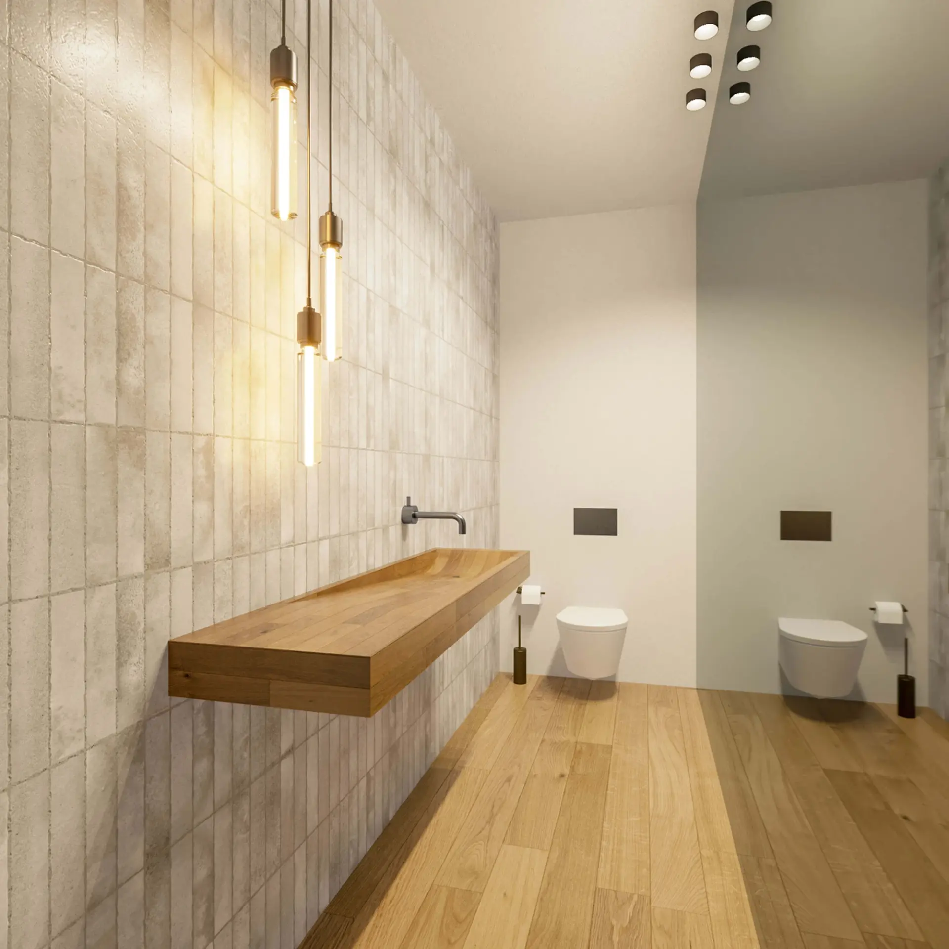 Solid-oak trough washbasin, a grey glazed-tile wall and tubular pendant lights above wall-hung toilets — luxury bathroom