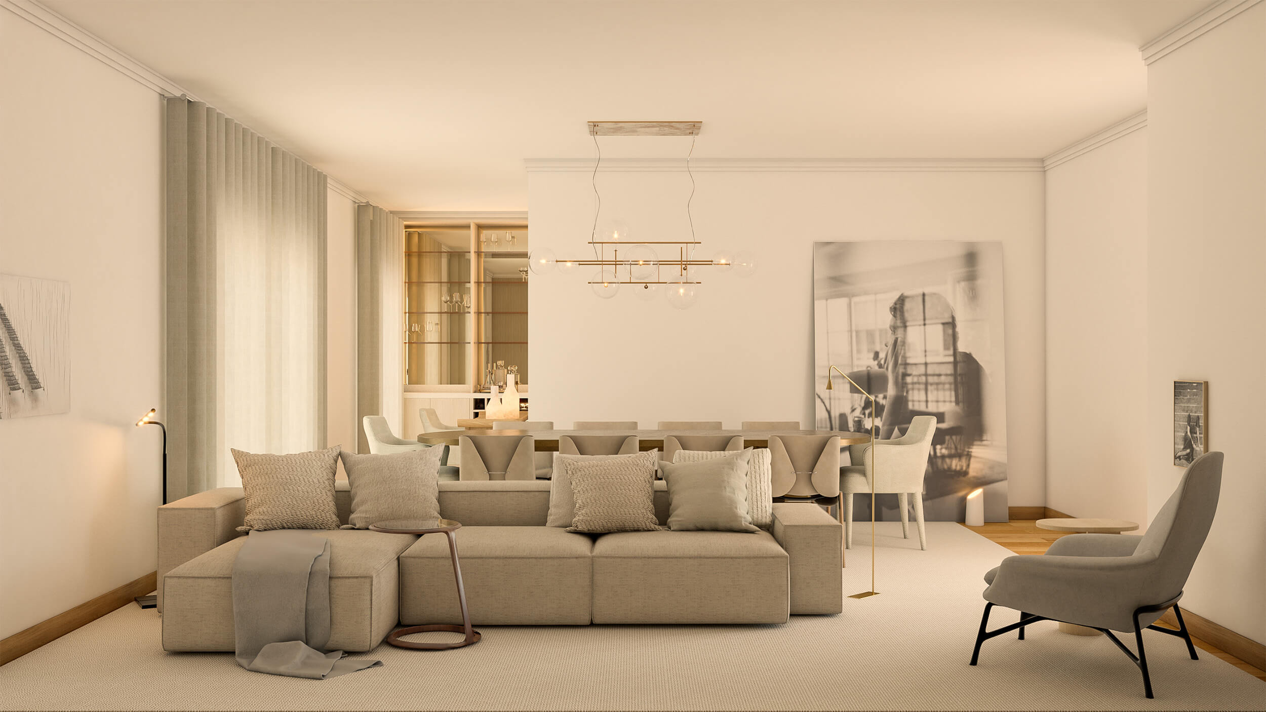 Beige modular linen sofa, brass globe linear chandelier and a large black-and-white photograph by a lounge chair — luxury living room