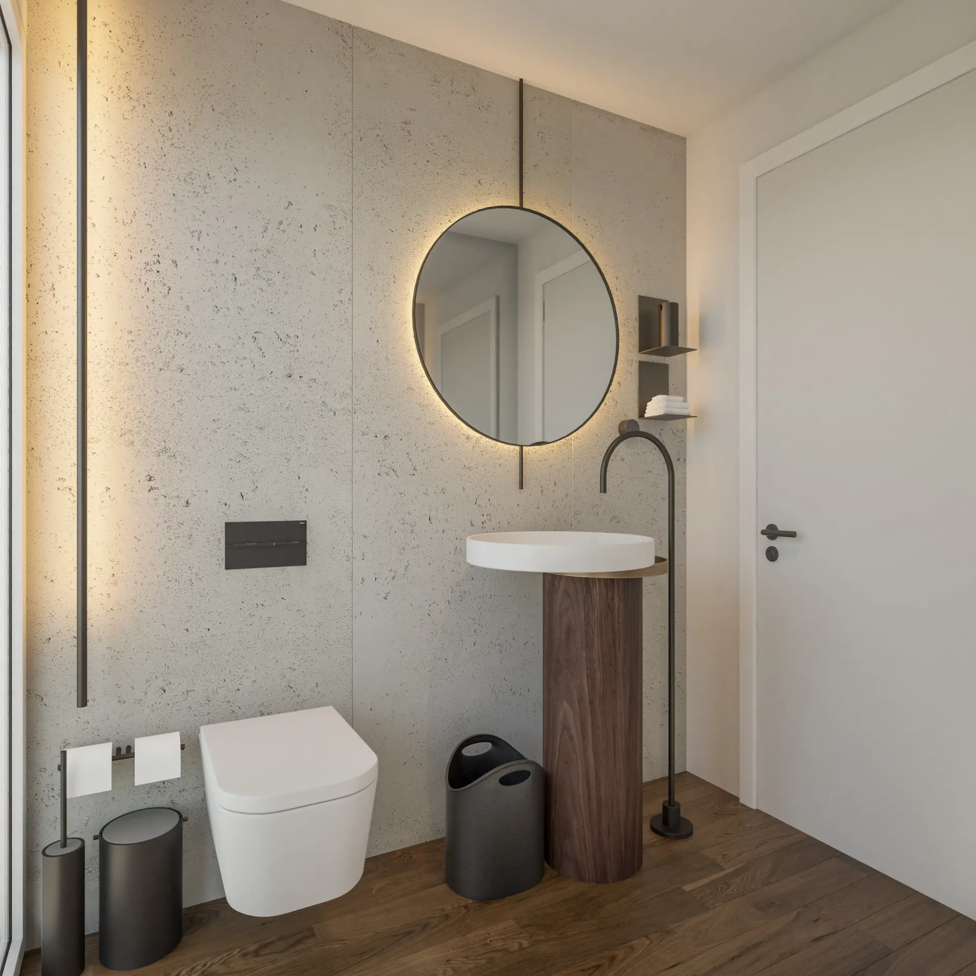 Contemporary bathroom interior design with a round illuminated mirror, pedestal basin, textured wall and dark metal details.