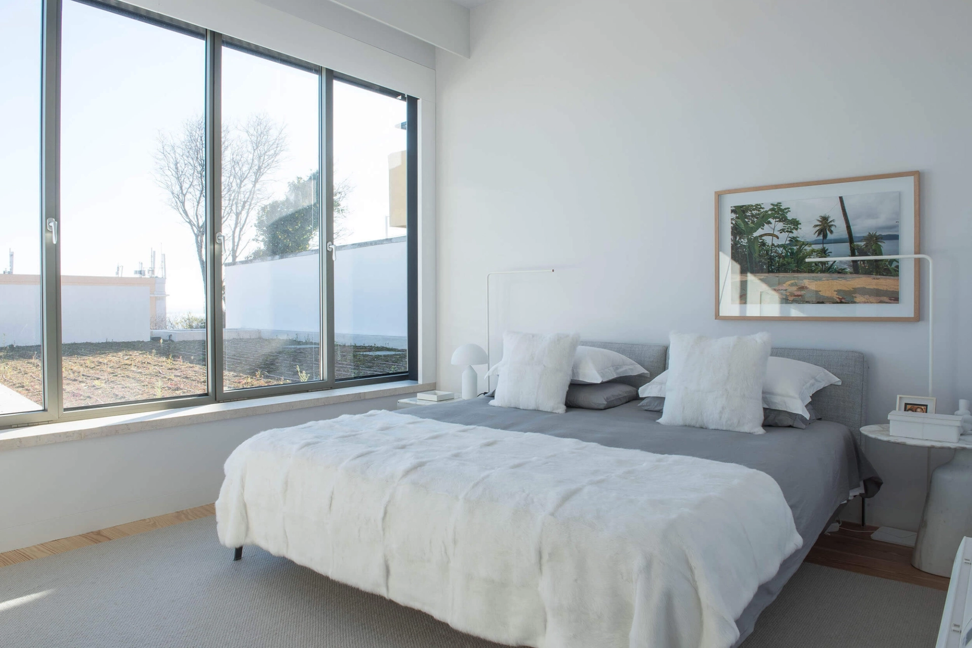 Master bedroom with Flexform bed, Poltrona Frau Calacatta Oro bedside tables and Roland Fischer artwork — luxury interior design, Lisbon, Atelier Renata Santos Machado