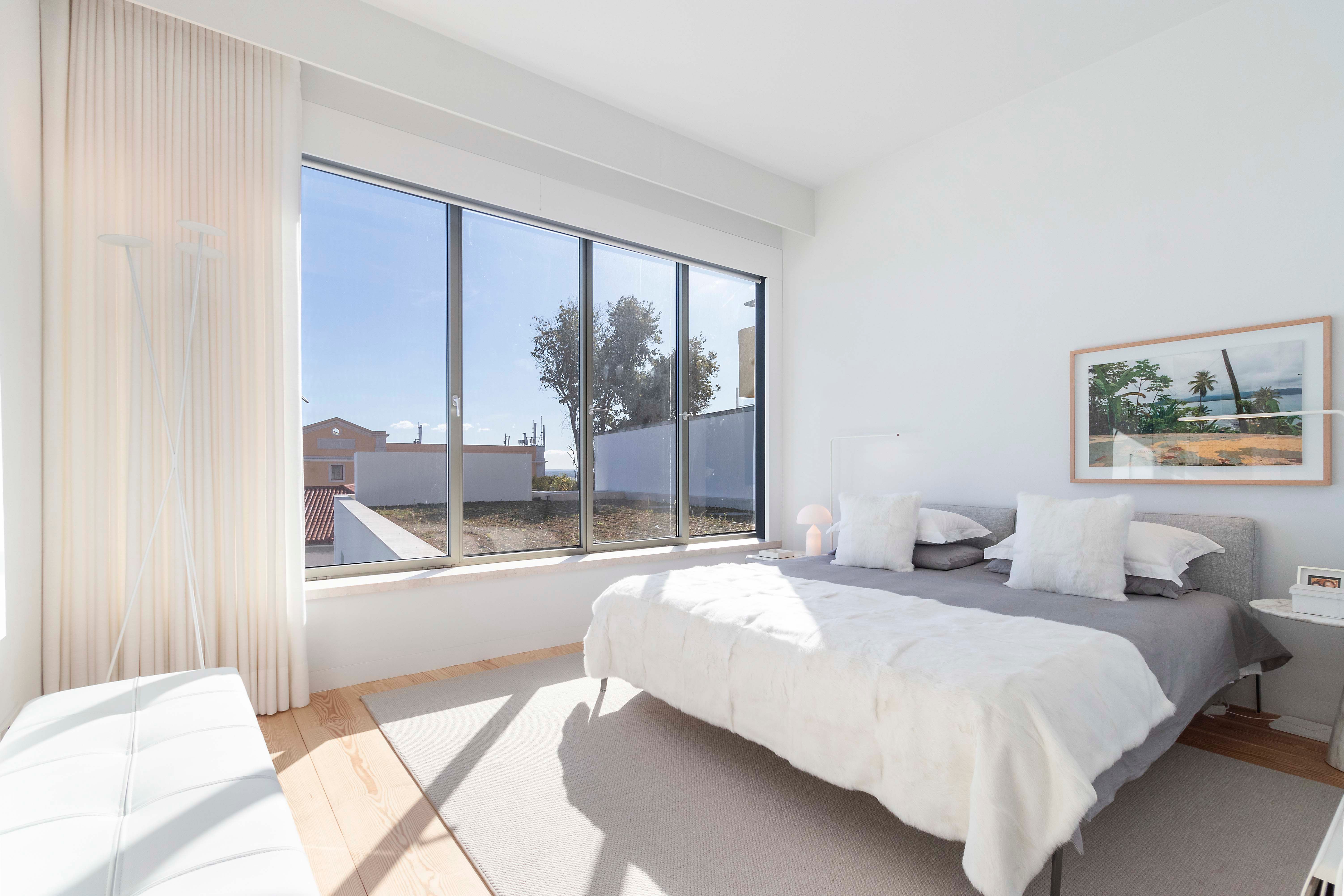Bright bedroom interior in a renovated property in Portugal