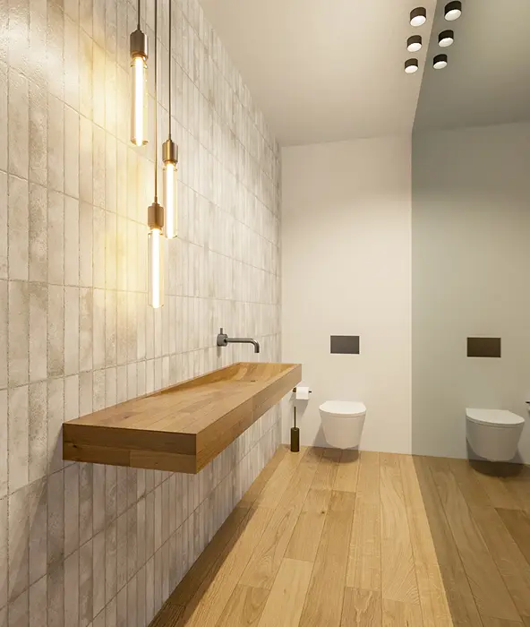 3D render of bathroom with suspended wood washbasin, natural stone cladding and brass pendant lights — luxury interior design project in Lisbon for international clients, Atelier Renata Santos Machado