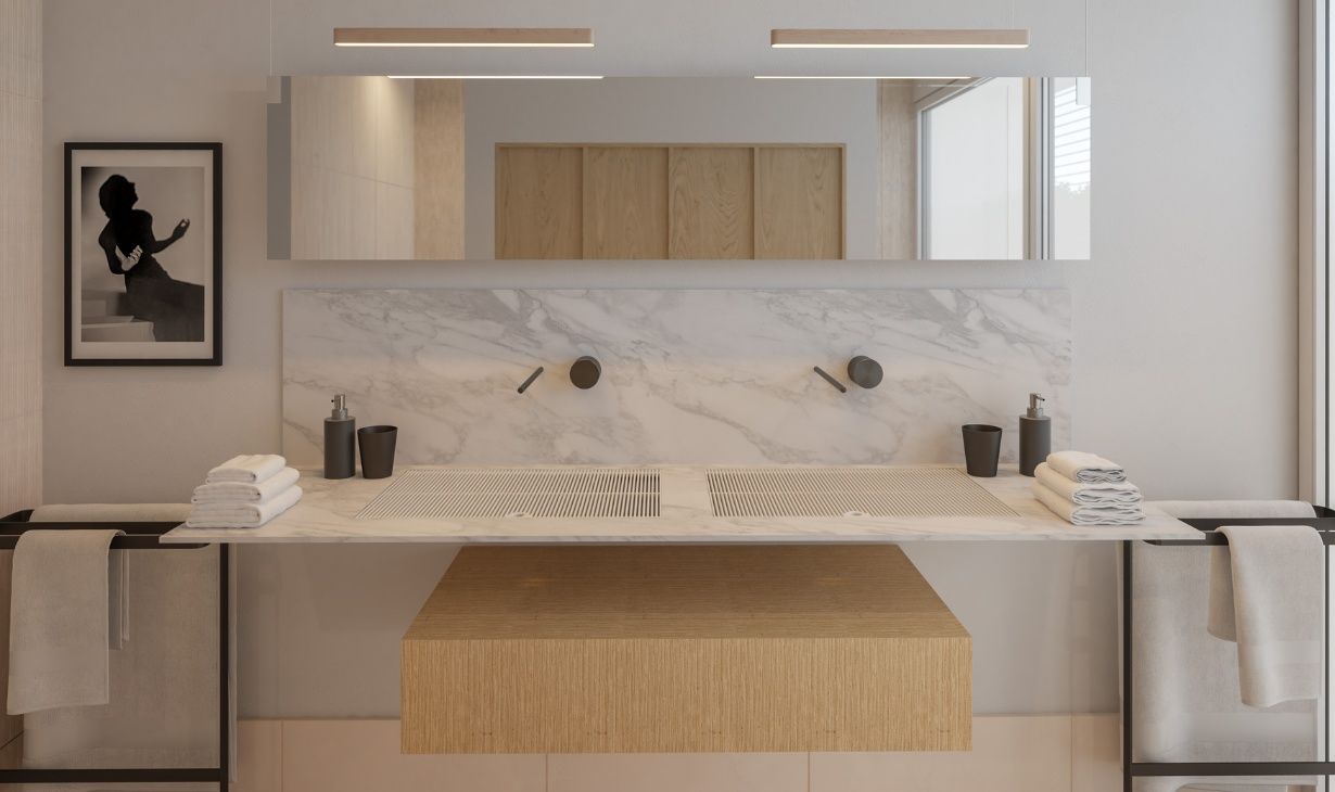 Modern bathroom with double sink vanity, marble surface and wood cabinetry in a turnkey interior design project