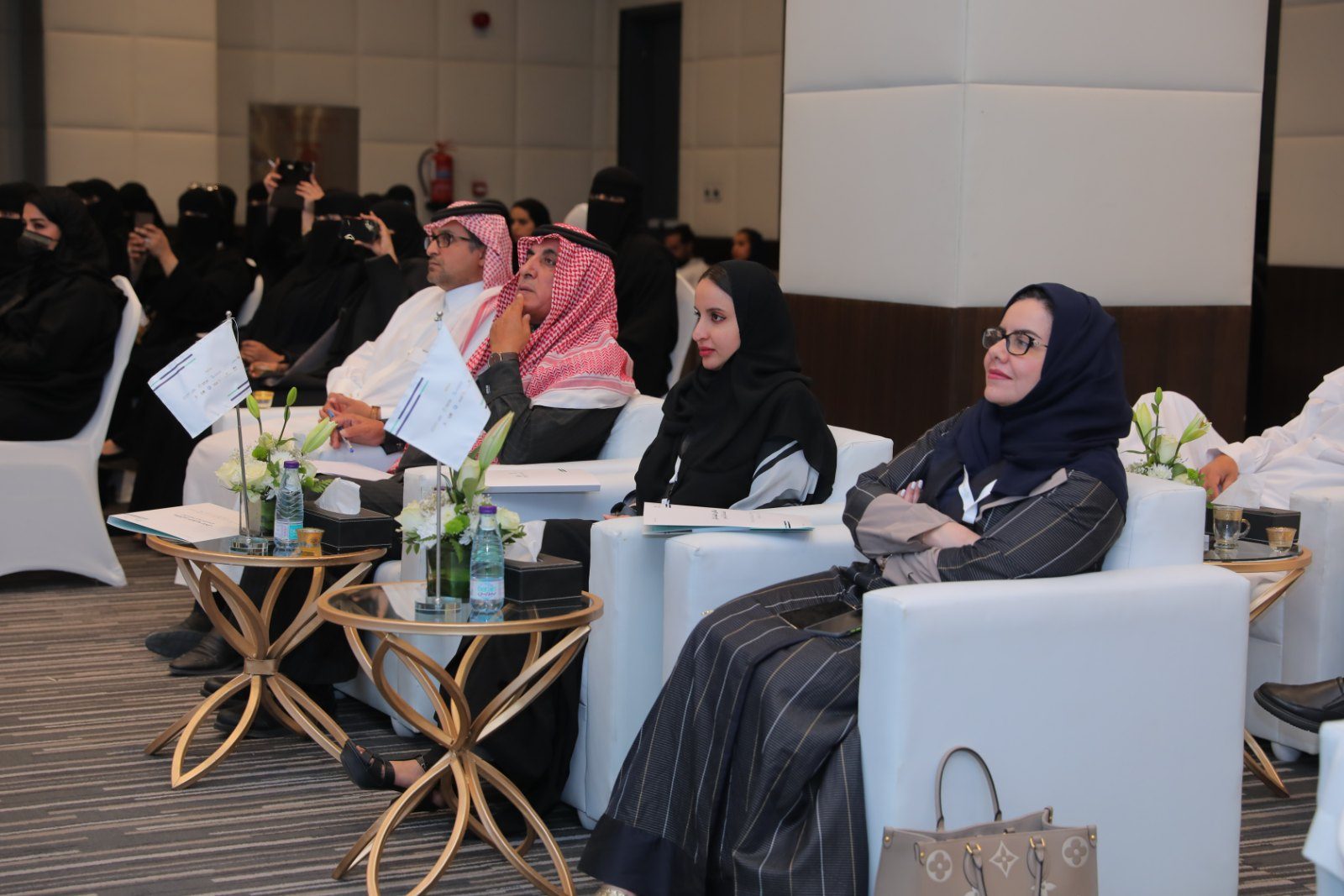 Guests and judges watching the pitches at the closing session