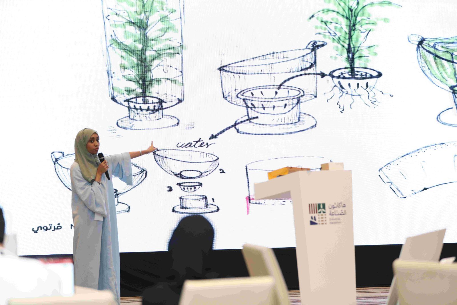 Participant pitching a concept at the Industrial Hackathon