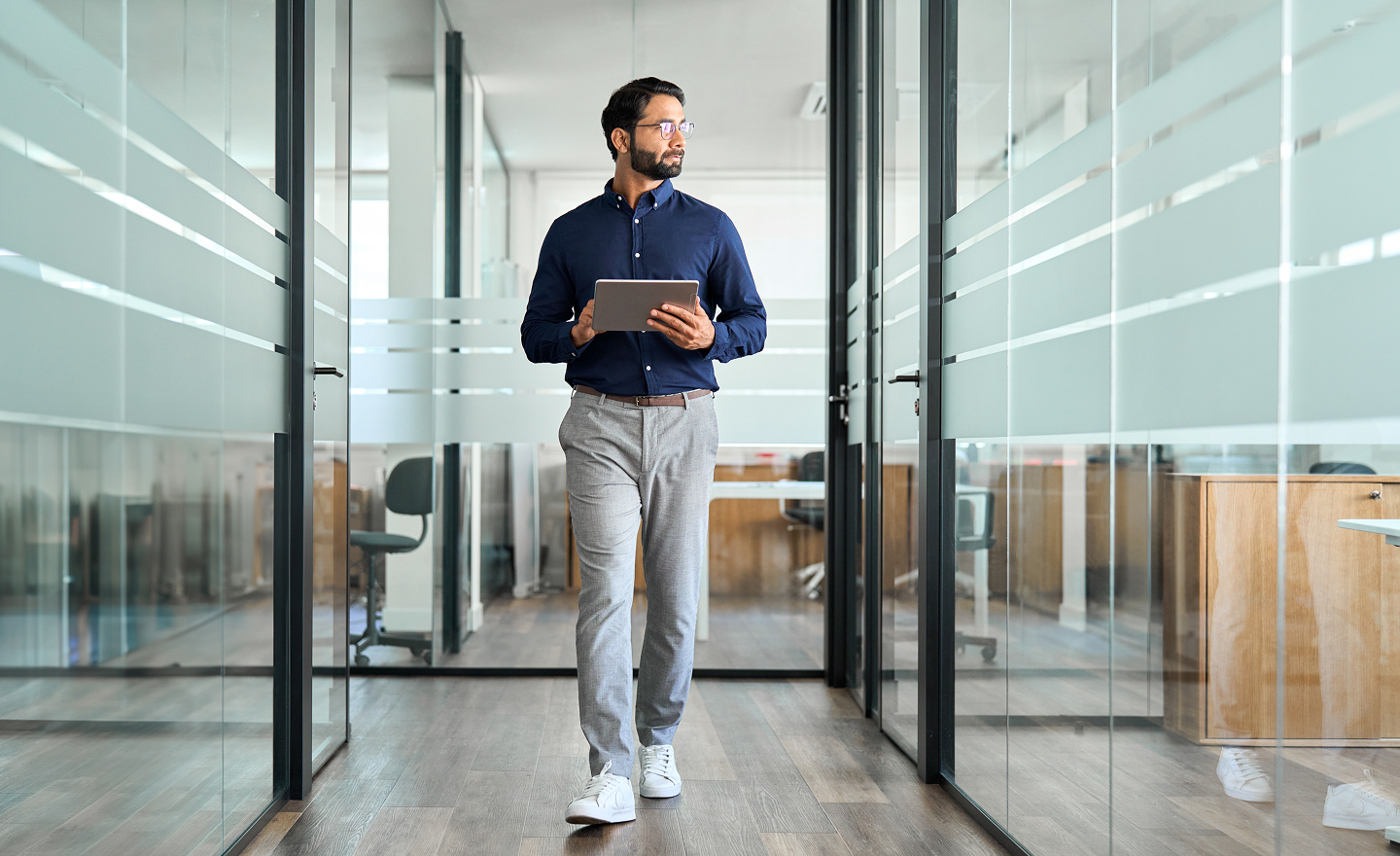man walking in office