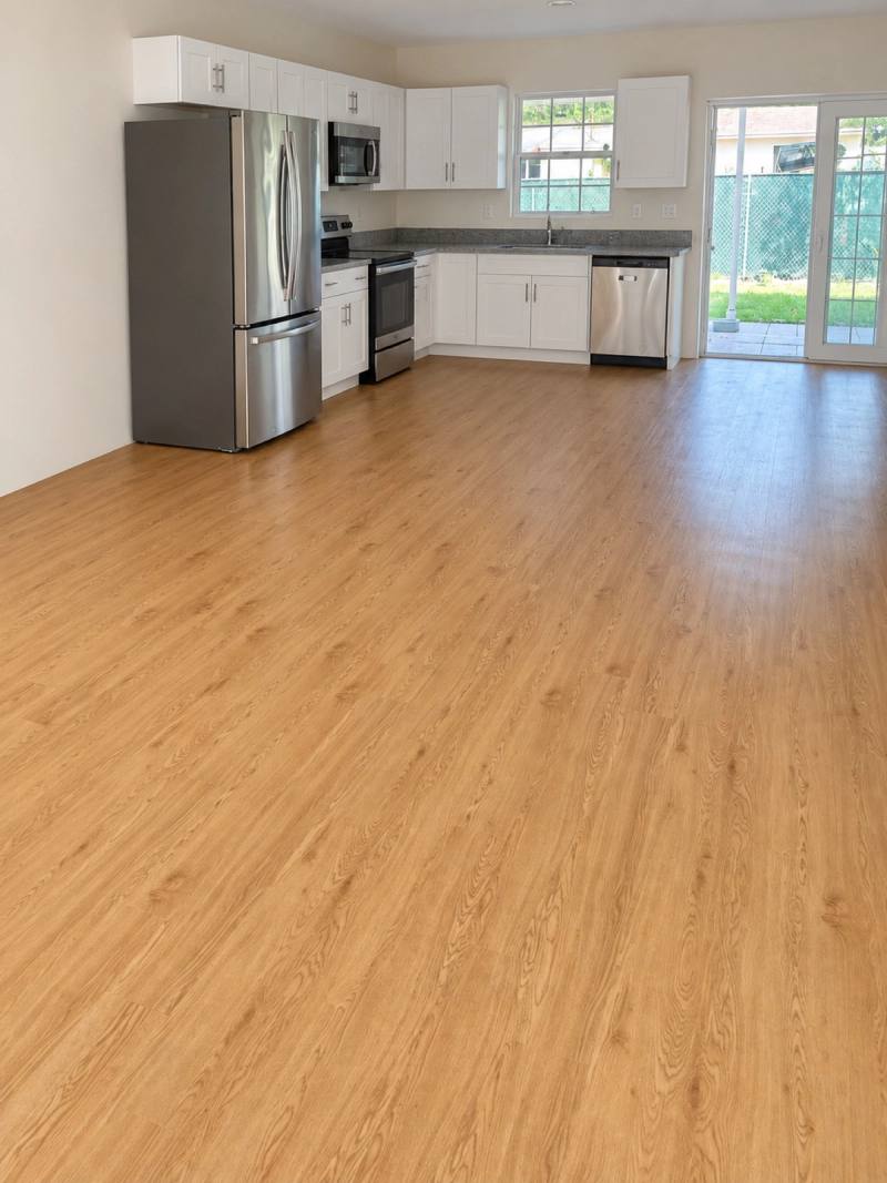 Kitchen with Natural Oak vinyl plank flooring installed by Lindcol
