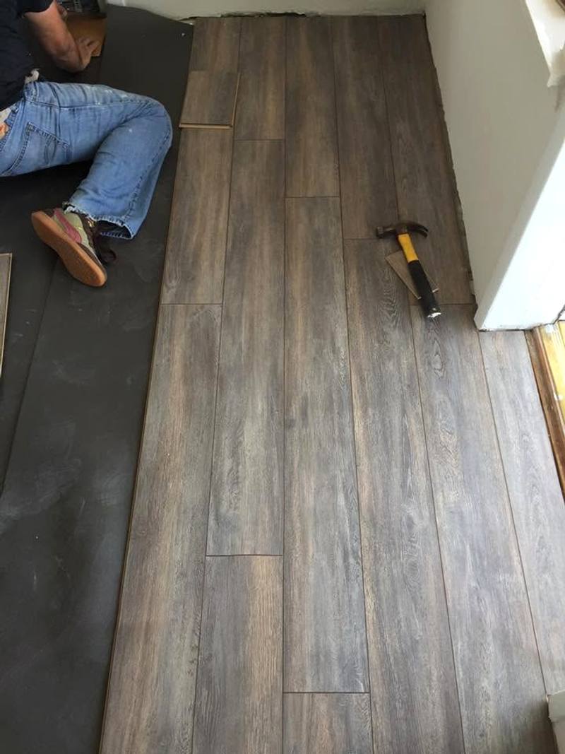 Lindcol installer laying a new floor