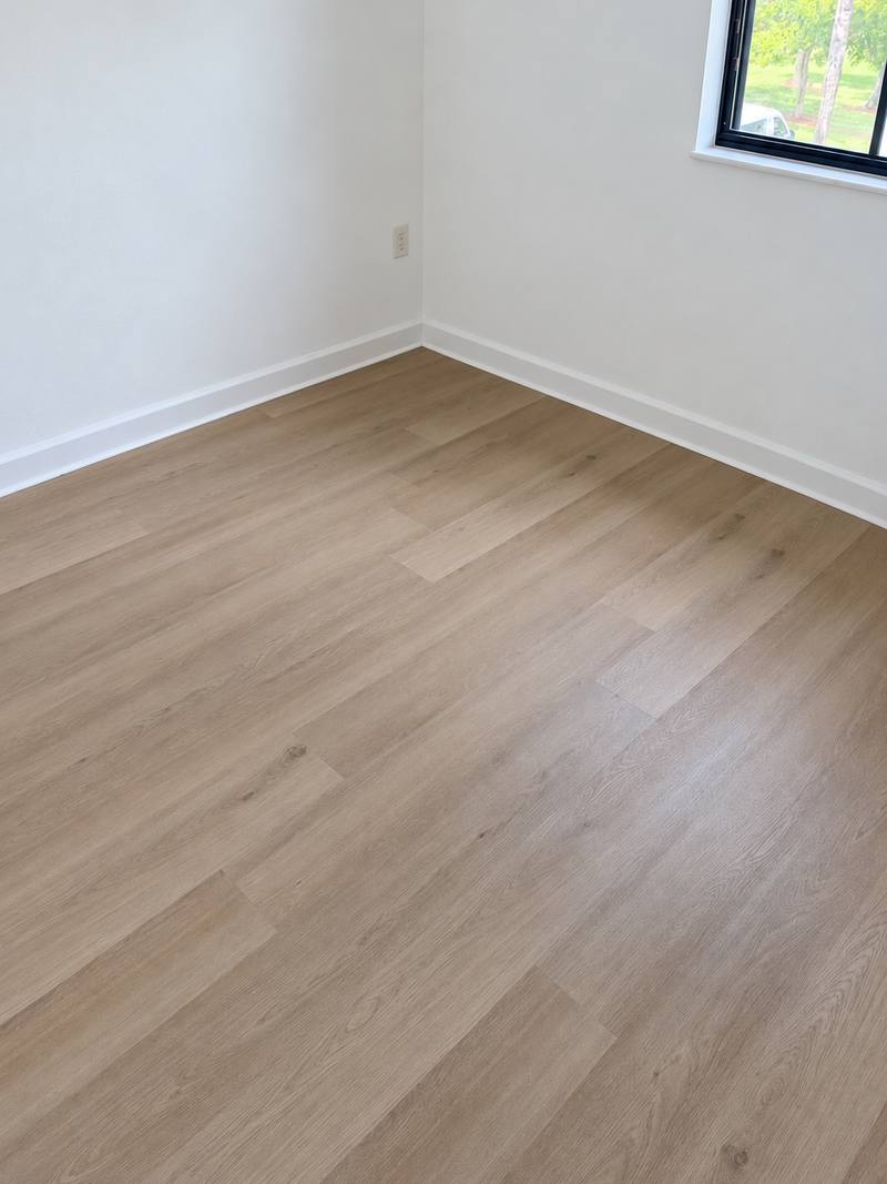 Room with Desert Oak vinyl plank flooring installed by Lindcol