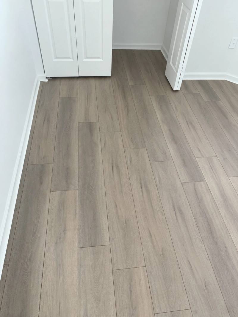 Room with Light Cappuccino laminate flooring installed by Lindcol