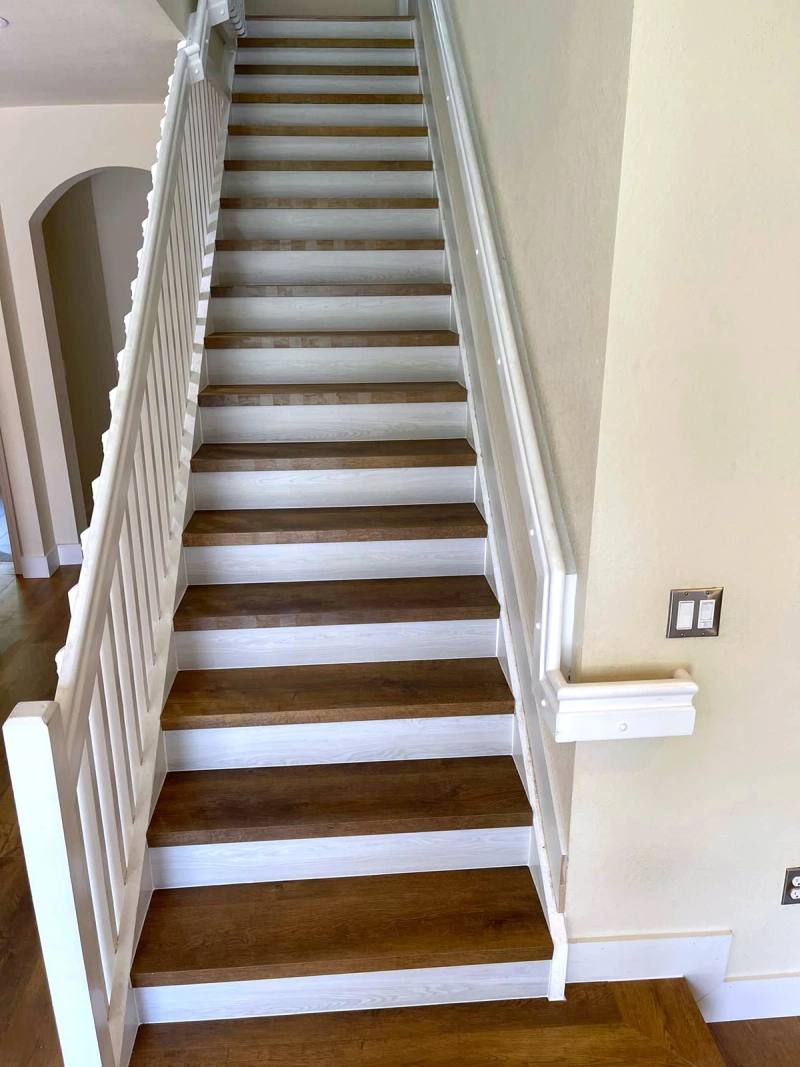 Finished staircase wrapped in vinyl by Lindcol