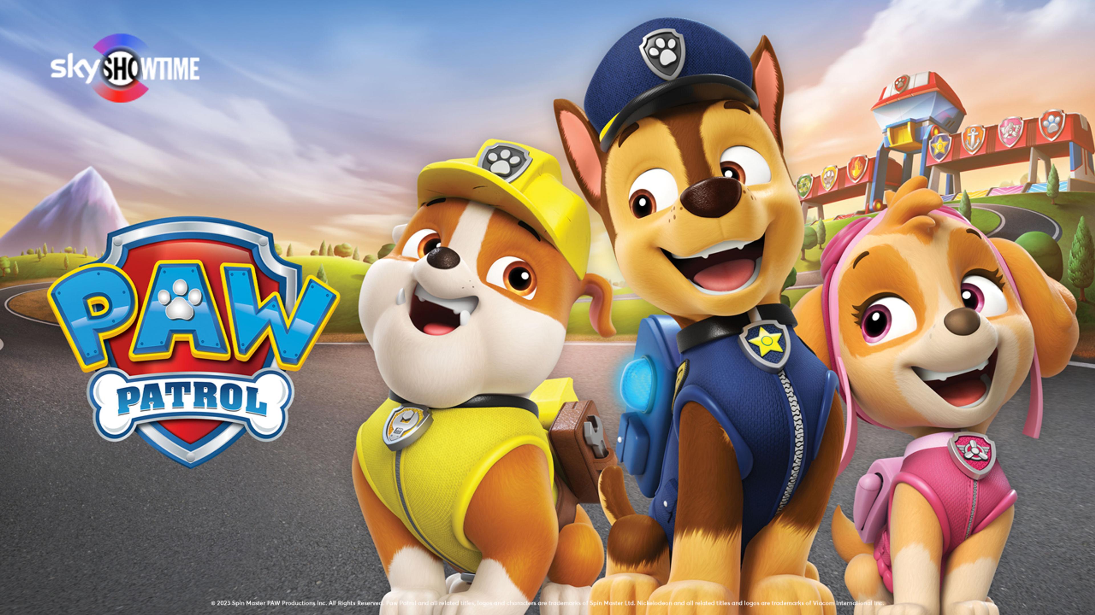 Pawpatrol-gjengen smiler bredt med redningsstasjonen i bakgrunnen.