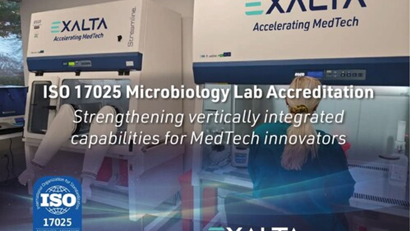 A lab technician works at an EXALTA biosafety cabinet with text announcing EXALTA's ISO 17025 Microbiology Lab Accreditation to strengthen capabilities for MedTech innovators.
