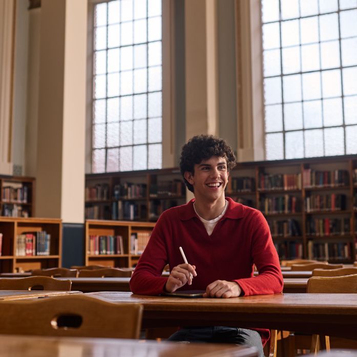 Person at a desk in a classroom