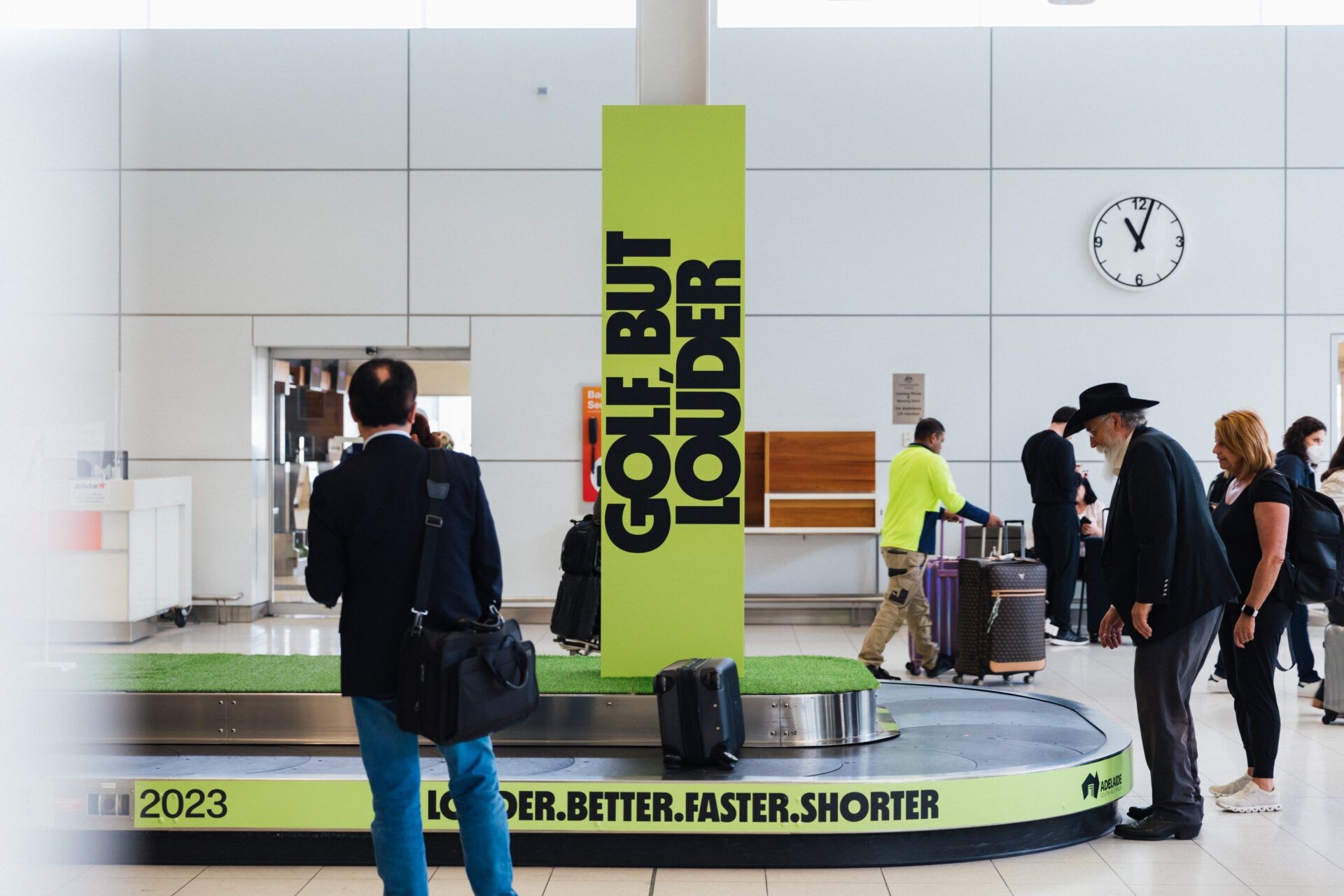 Liv golf branding on the baggage carousel at the airport