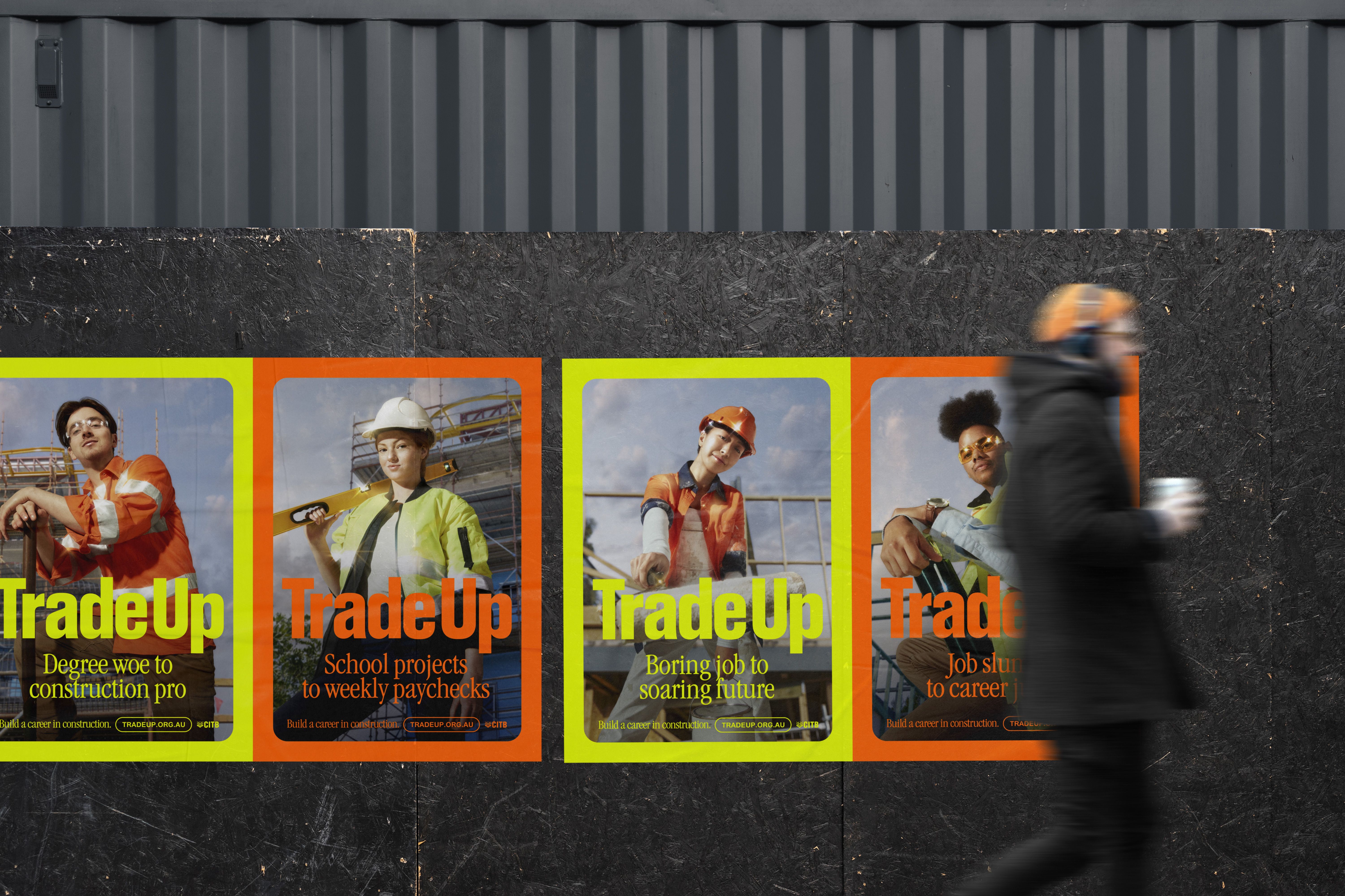 Trade up posters on a street wall