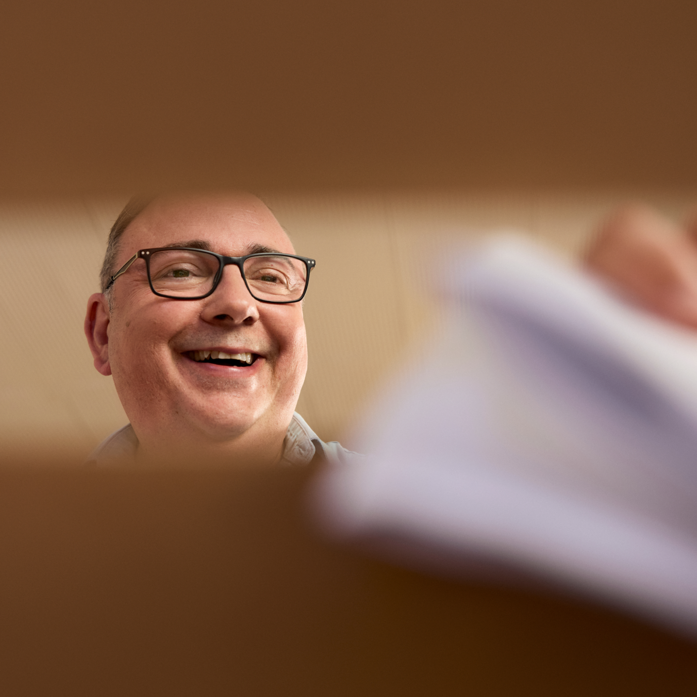 Smiling person featured in Electoral Commission of South Australia campaign imagery.
