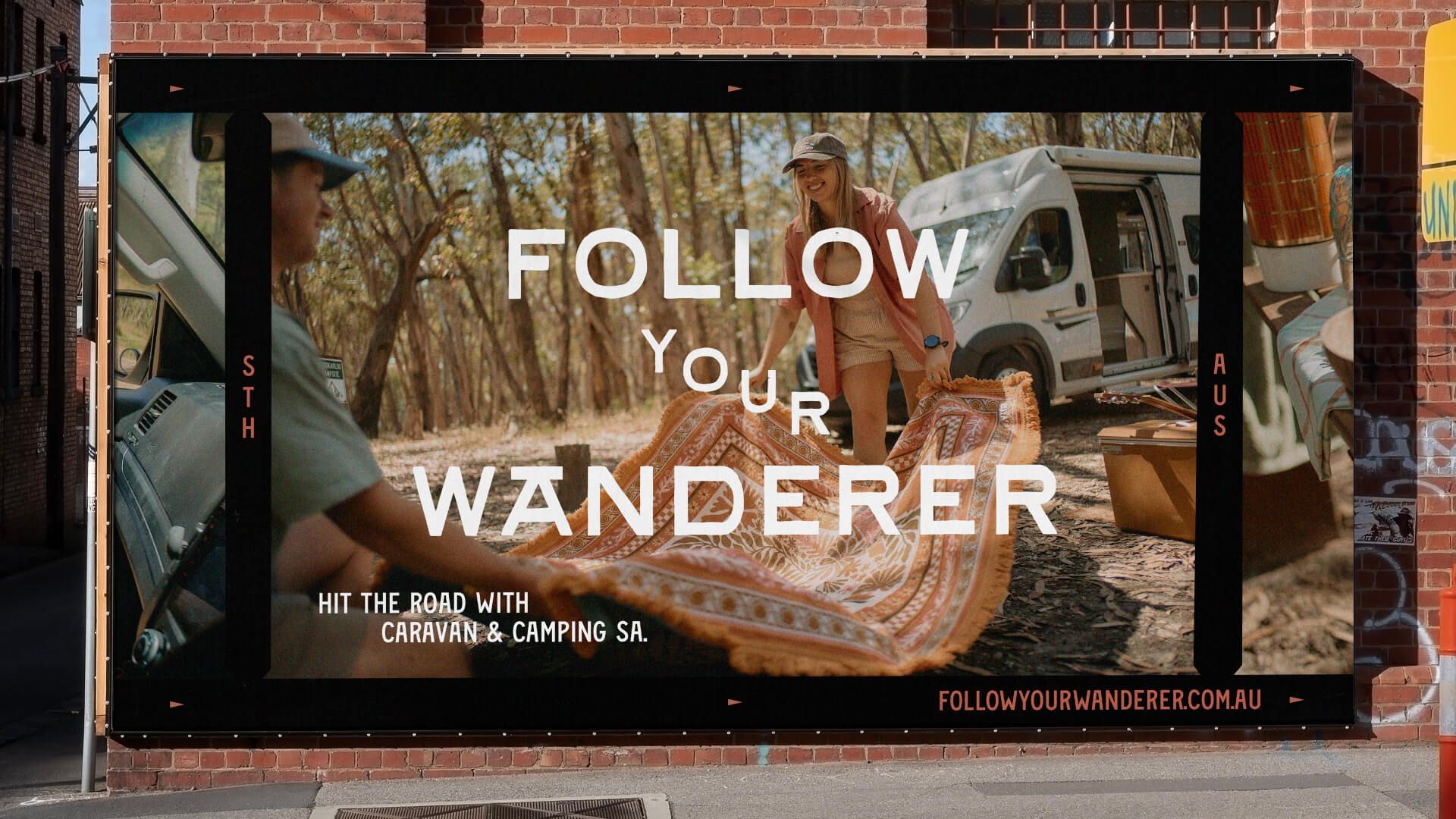 “Follow Your Wanderer” outdoor campaign displayed on a large-format billboard.