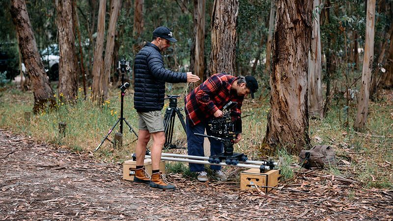 Video team setting up outdoors