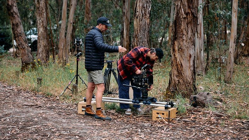Video team setting up outdoors