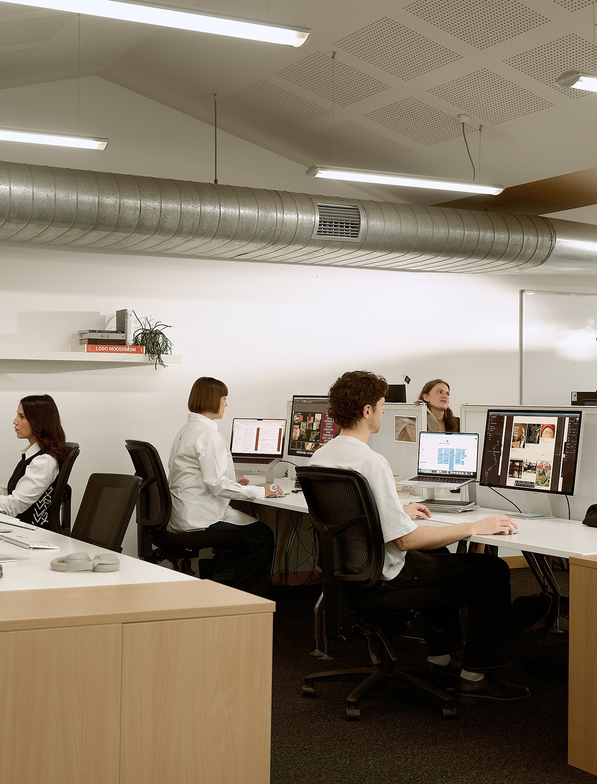 The fuller team working in the upstairs open office
