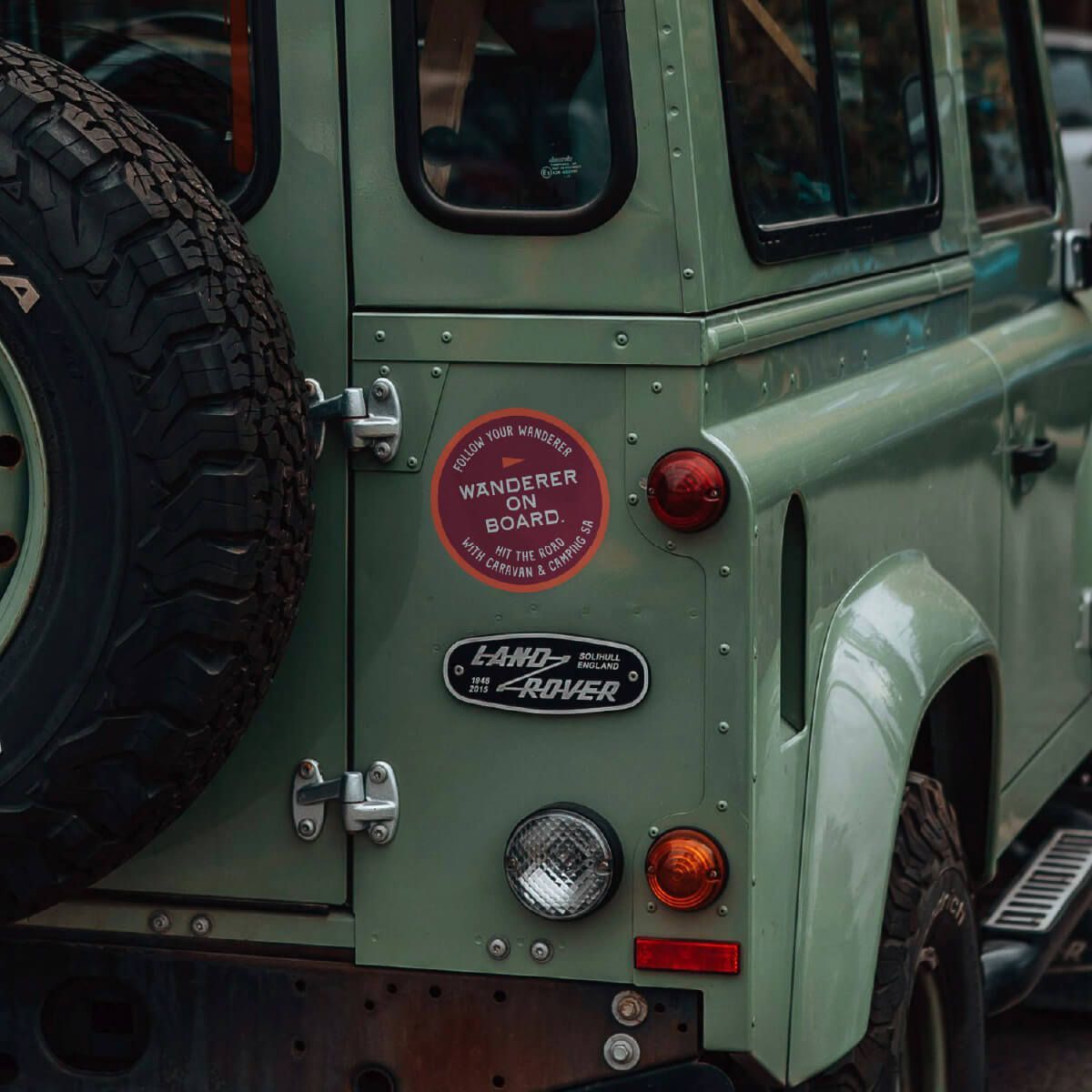 Follow your wanderer brand sticker shown on back of a land rover