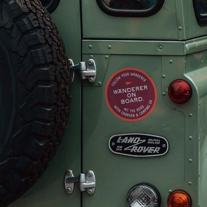 Follow your wanderer brand sticker shown on back of a land rover