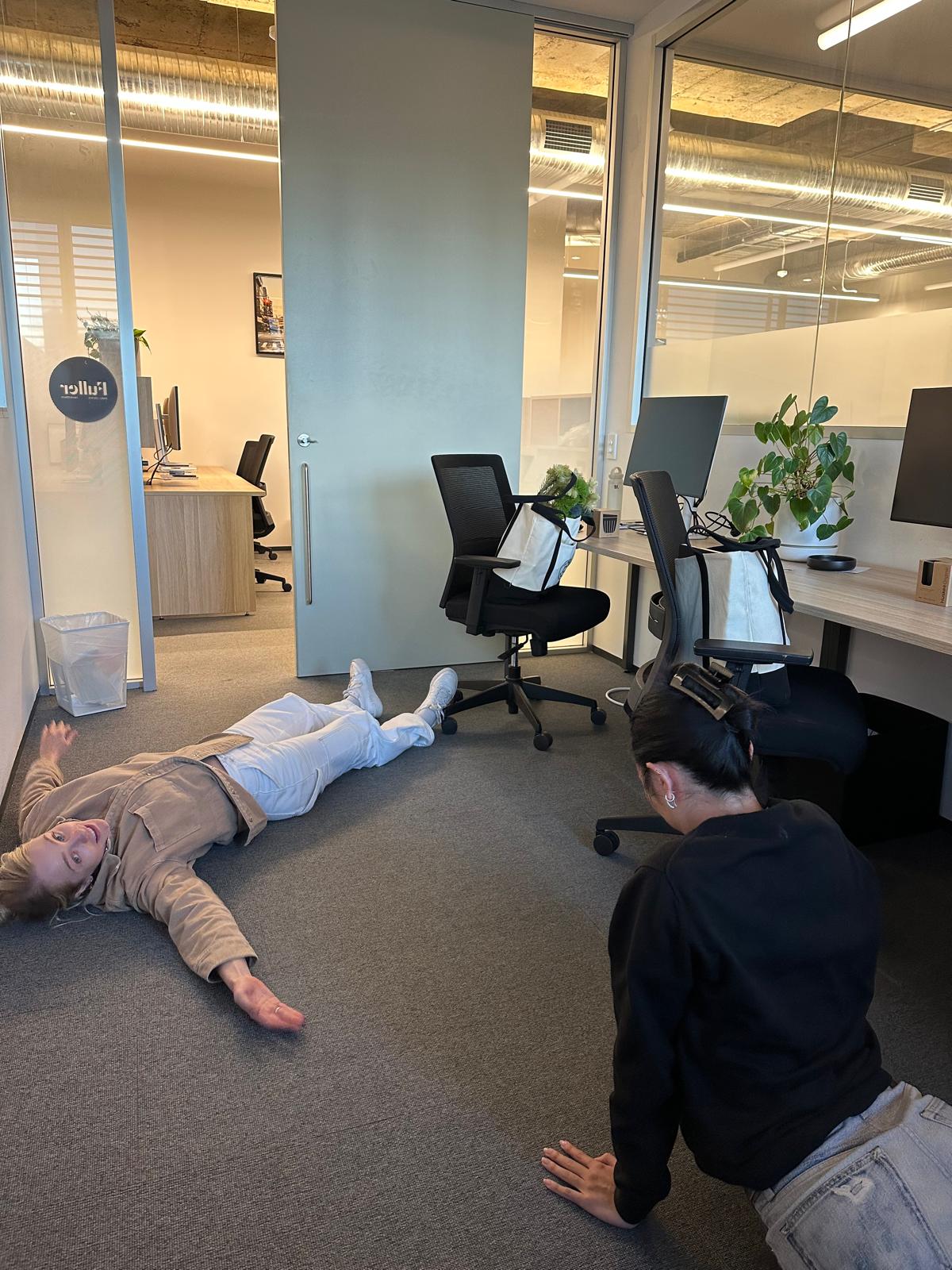 Bianka and Raph our Sydney Account Managers laying on the office floor after a long day