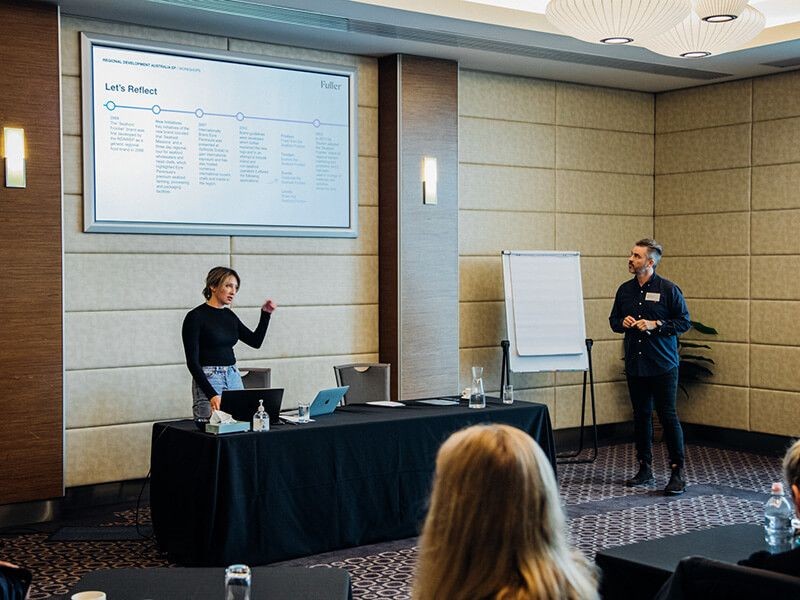 Fuller team holding a brand workshop in a large room