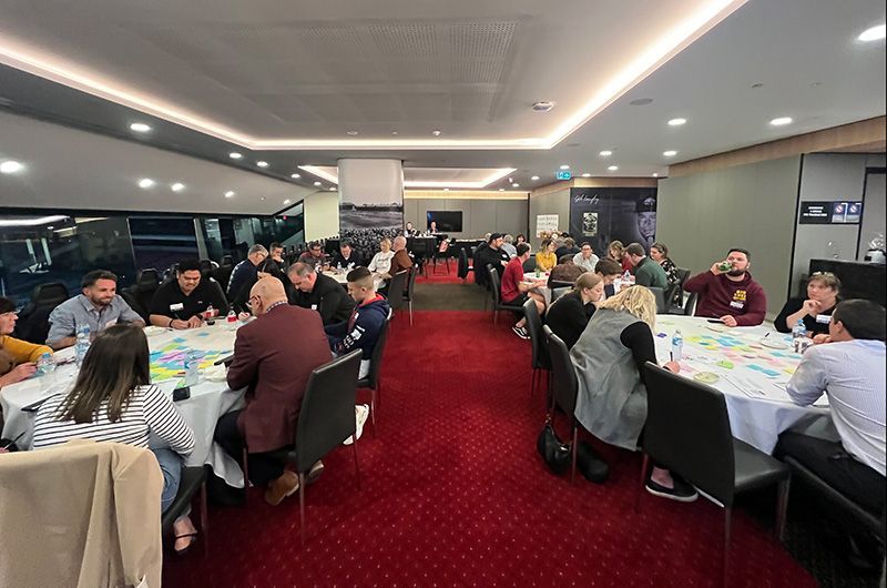 Room full of fans participating in the engagement workshop
