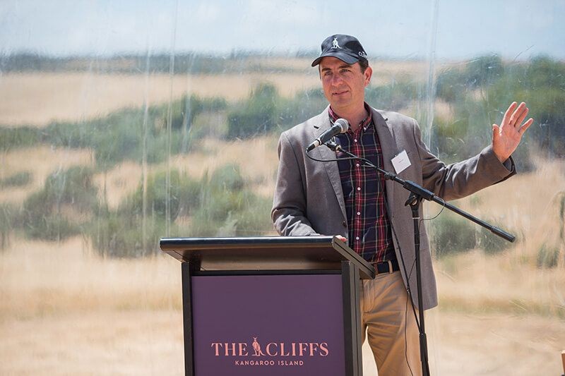 Speaker addressing guests from The Cliffs branded lectern at the Kangaroo Island launch event.
