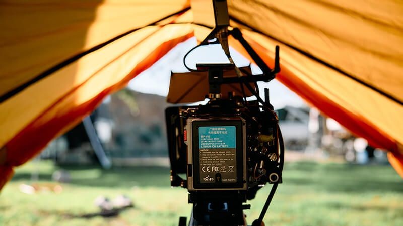 Camera set up inside a tent looking out
