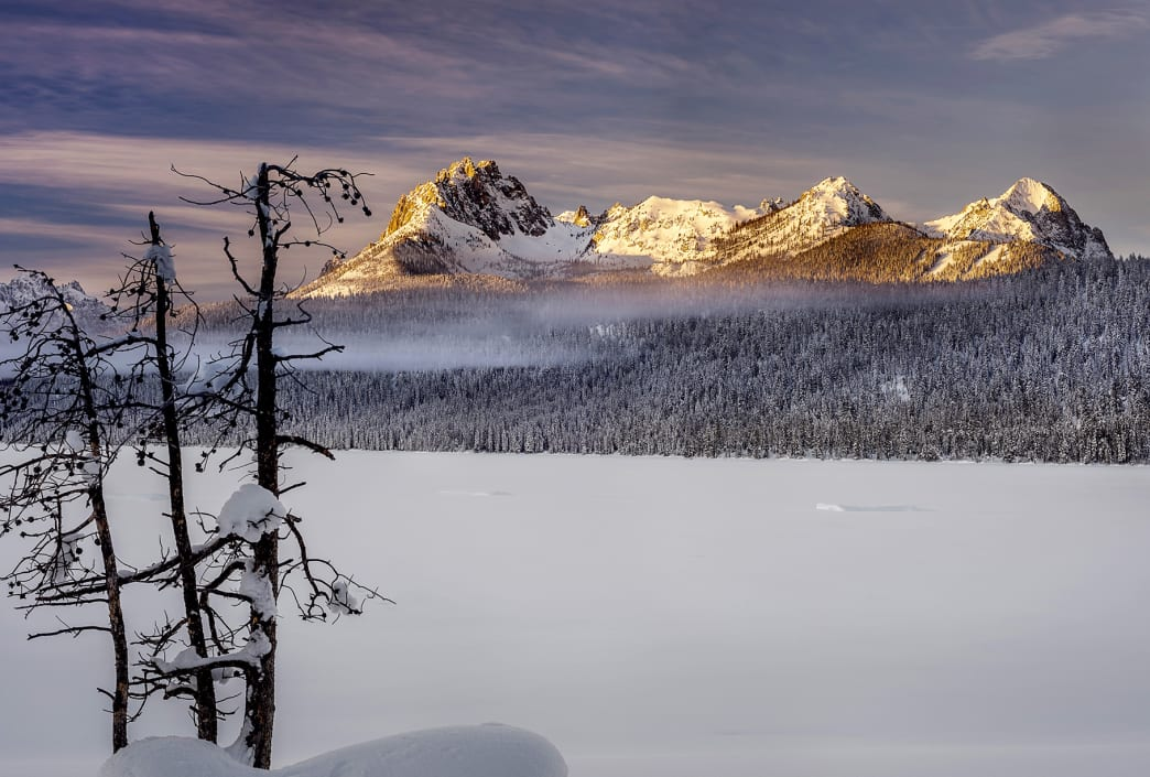 snowy landscape with mountains in Stanley, ID | Stanley chamber