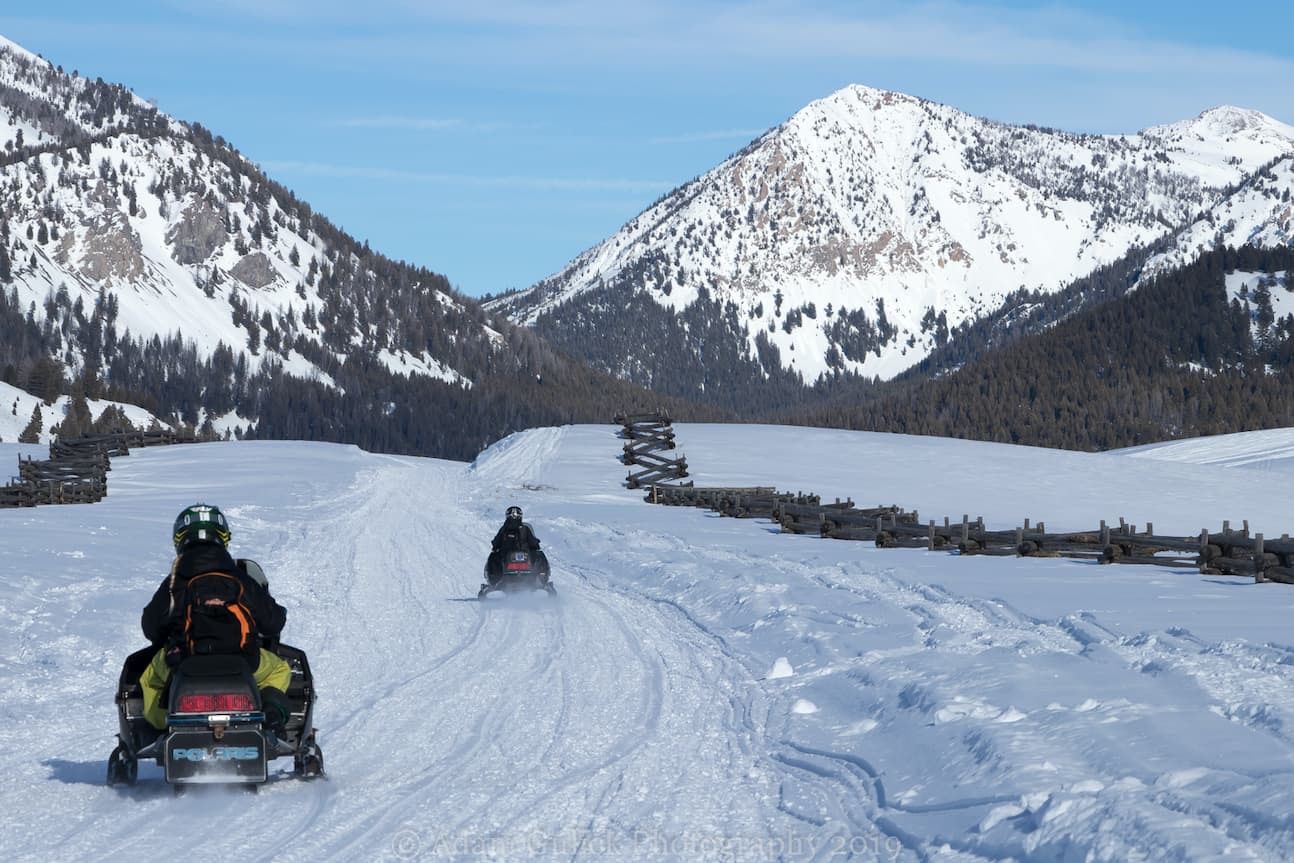 Snowmobile trail heading up the Mountains of Stanley, ID | Stanley Chambers