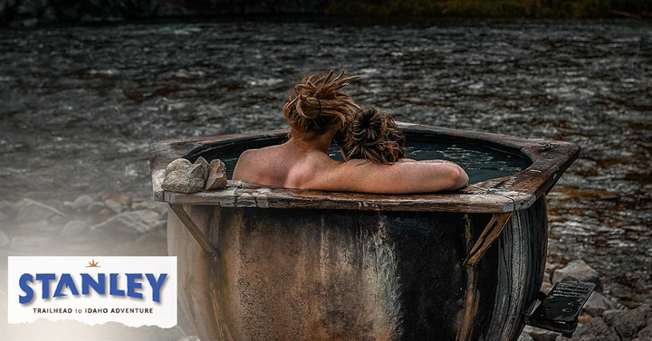 A couple in a hot springs in Stanley, ID | Stanley Chamber