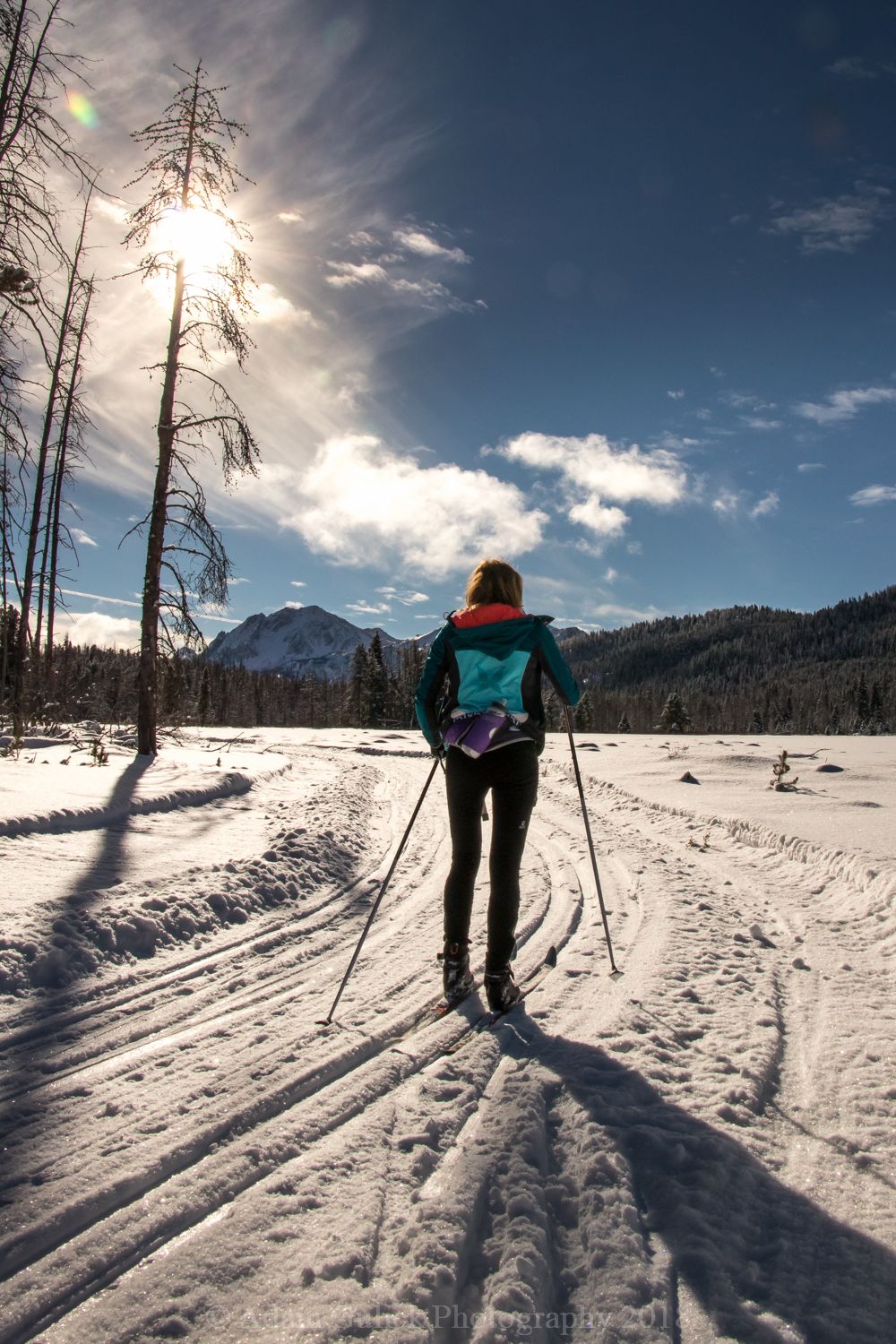 Skier working her way through the trails of Stanley, ID | Stanley Chambers