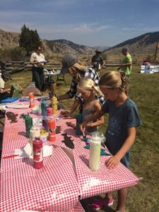 Young Kids at Picnic Table | Stanley Chamber